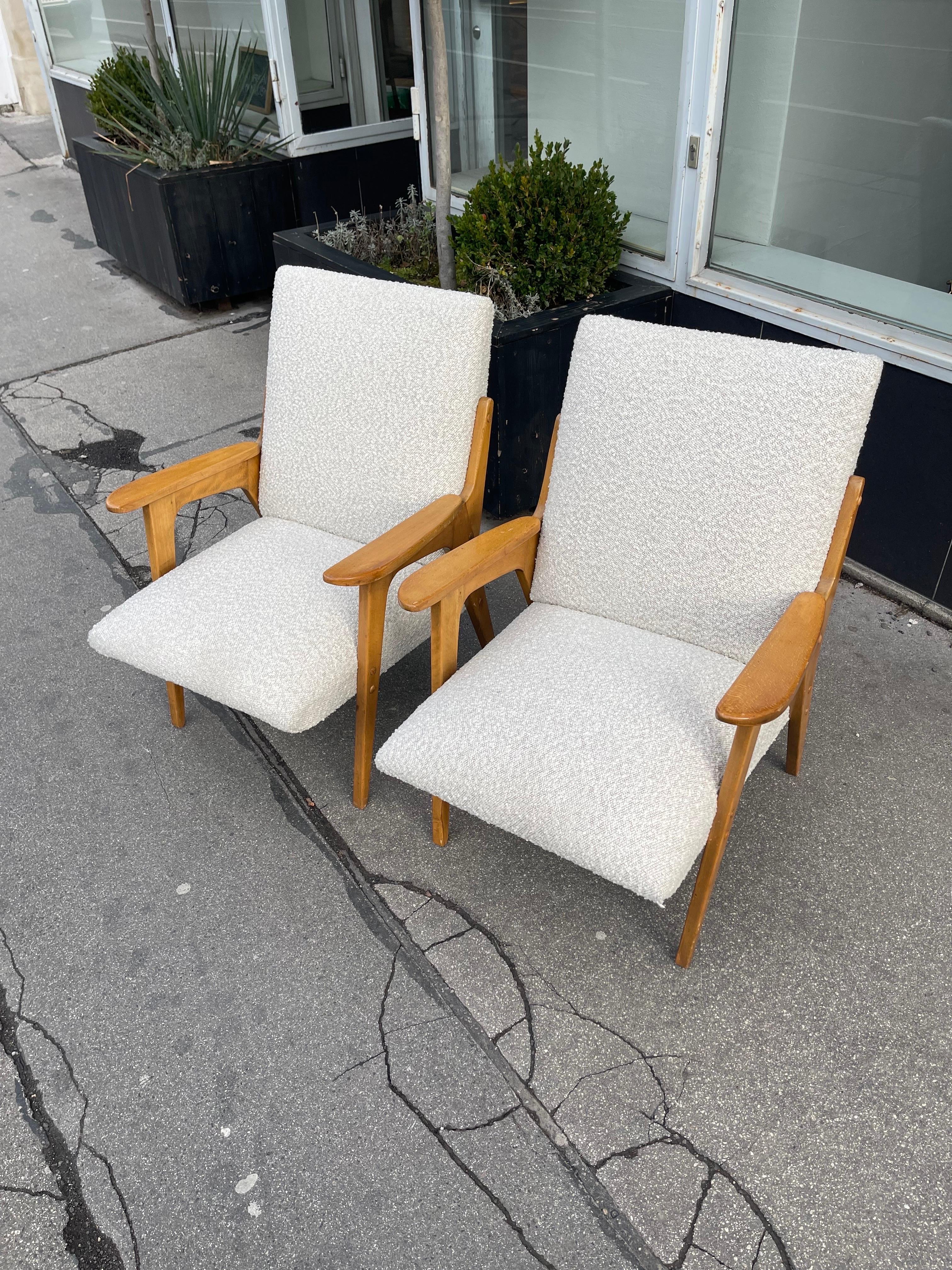 Franz Schuster Lounge arm chairs style of Gio Ponti, Austria 1950s. Reupholstered in off white boucle fabric.
  