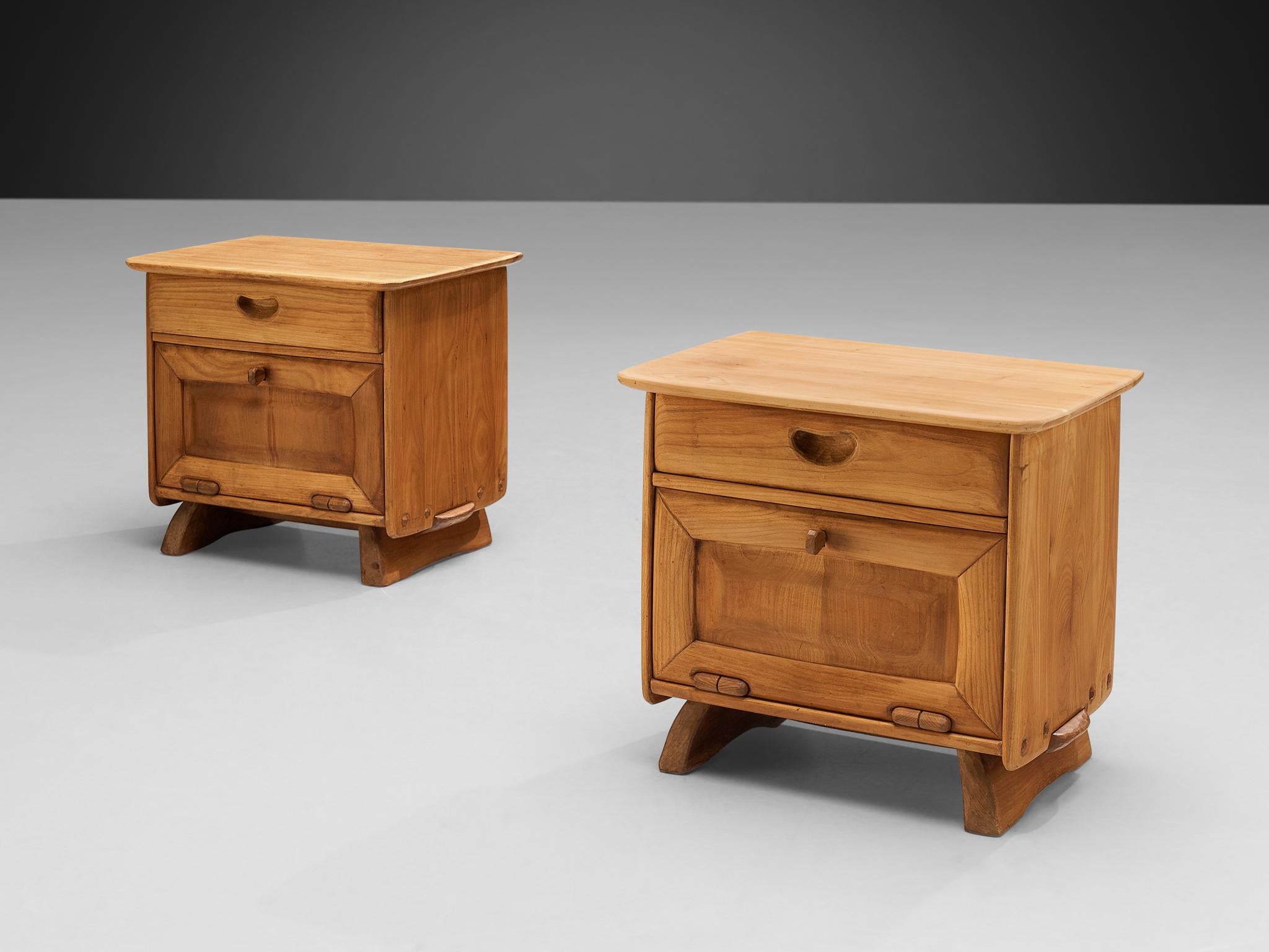Franz Xaver Sproll, pair of night stands, elm, Switzerland, 1960s. 

Swiss furniture maker Franz Xaver Sproll is known for high-quality, hand-crafted furniture in solid wood, featuring characteristic details. This night stand, par example, shows