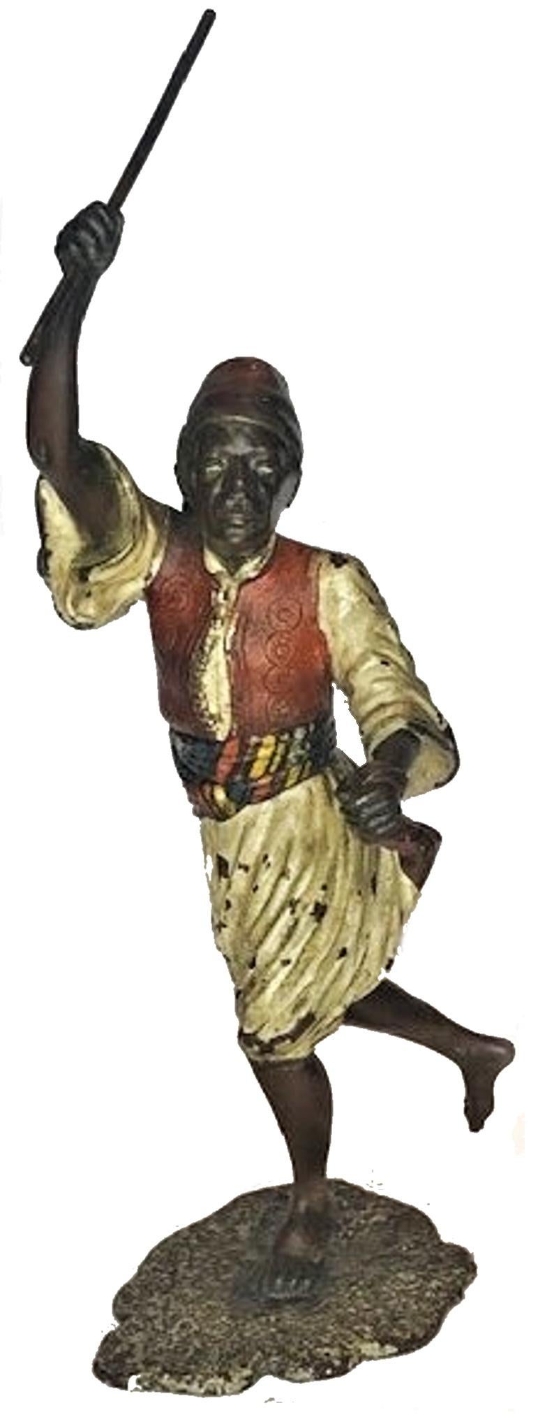 Artist: Franz Xaver Bergmann 

Sculpture: Moorish Warrior

Description: This wonderful life-like sculpture depicts a Moorish warrior in a historical costume, at the moment of throwing a javelin. It is created in polychrome cold-painted bronze,