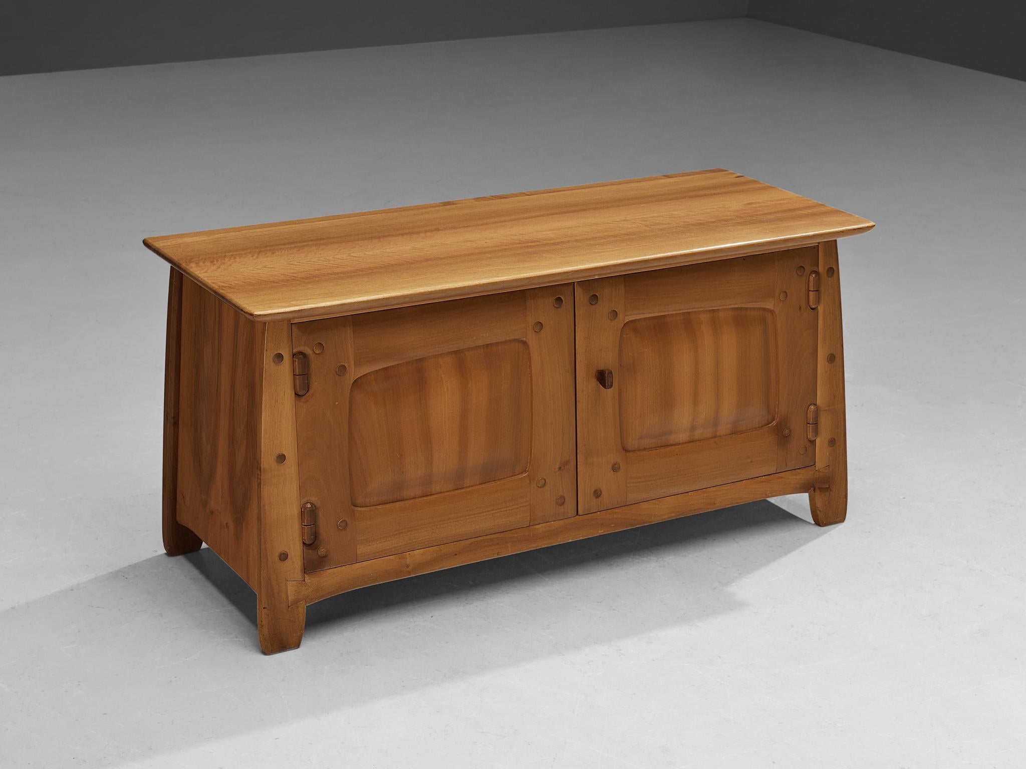 Franz Xaver Sproll, sideboard, walnut, Switzerland, 1960s 

Swiss furniture maker Franz Xaver Sproll is known for high-quality, hand-crafted furniture in solid wood, featuring characteristic details. The viewer can follow the lines of the craftsman