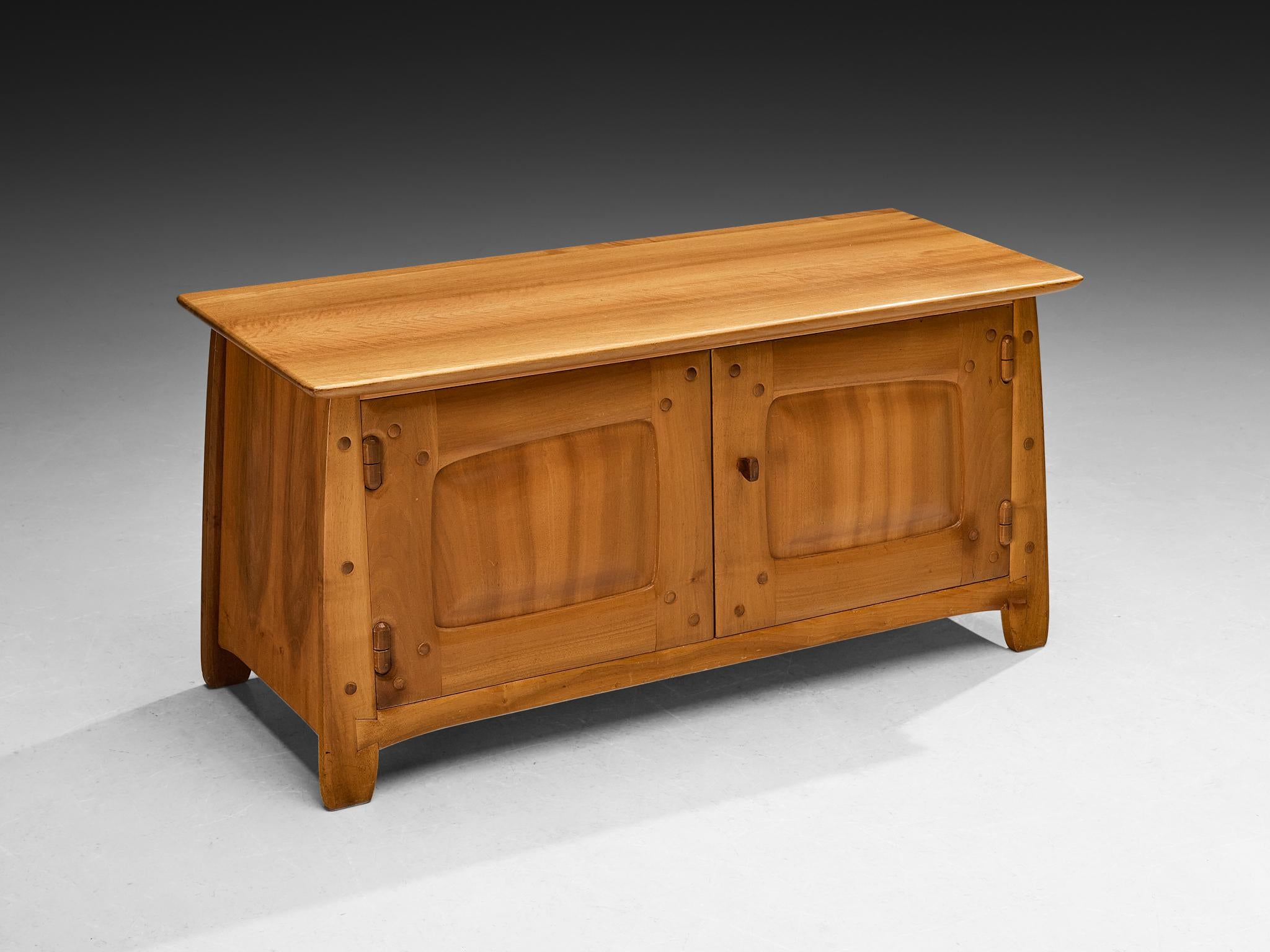 Franz Xaver Sproll, sideboard, walnut, Switzerland, 1960s 

Swiss furniture maker Franz Xaver Sproll is known for high-quality, hand-crafted furniture in solid wood, featuring characteristic details. The viewer can follow the lines of the craftsman
