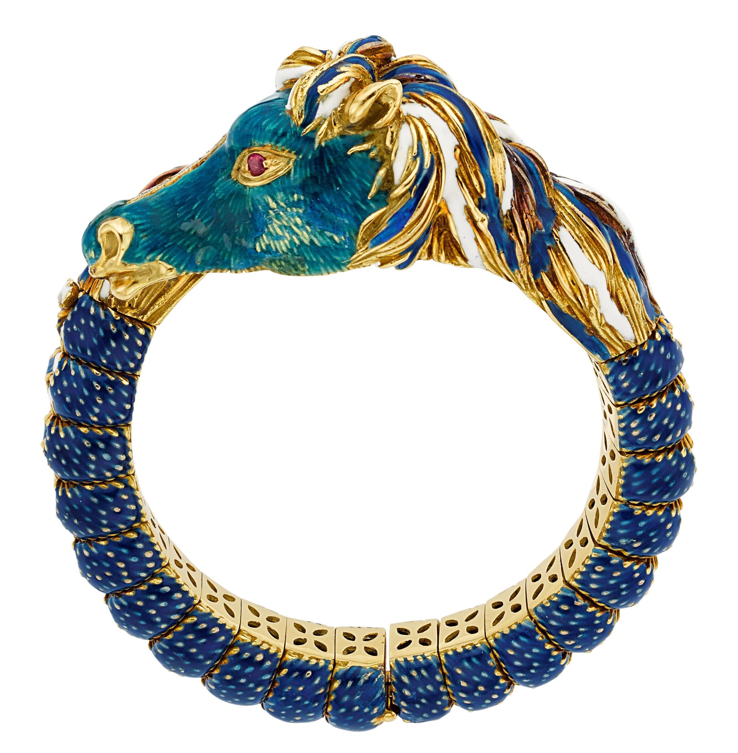 Frascarolo 18k Yellow Gold Diamond, Ruby, and Enamel Horse Bangle 1960s

Gorgeous, Iconic Bangle Bracelet by Frascarolo
Features Appx 0.45 ct Diamonds
Average Color = G - I
Average Clarity = SI
Features Appx 0.10 cts
Enamel Accents over 18k