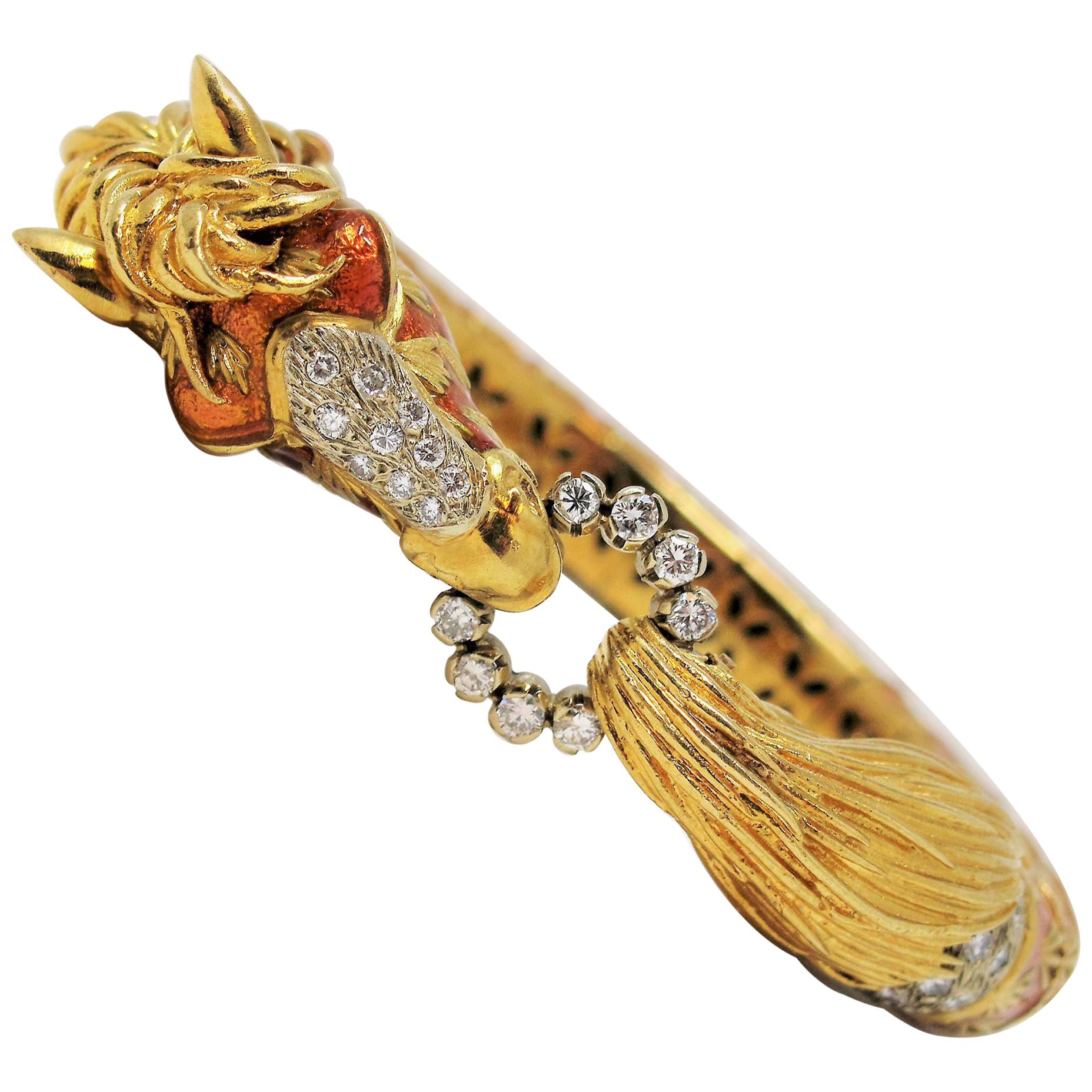 Calling all equestrian lovers! This incredible horse head bangle bracelet by Frascarolo is truly a wearable work of art.  Featuring an intricately carved 18 karat yellow gold and enamel design, accented by icy white diamonds, this rare and
