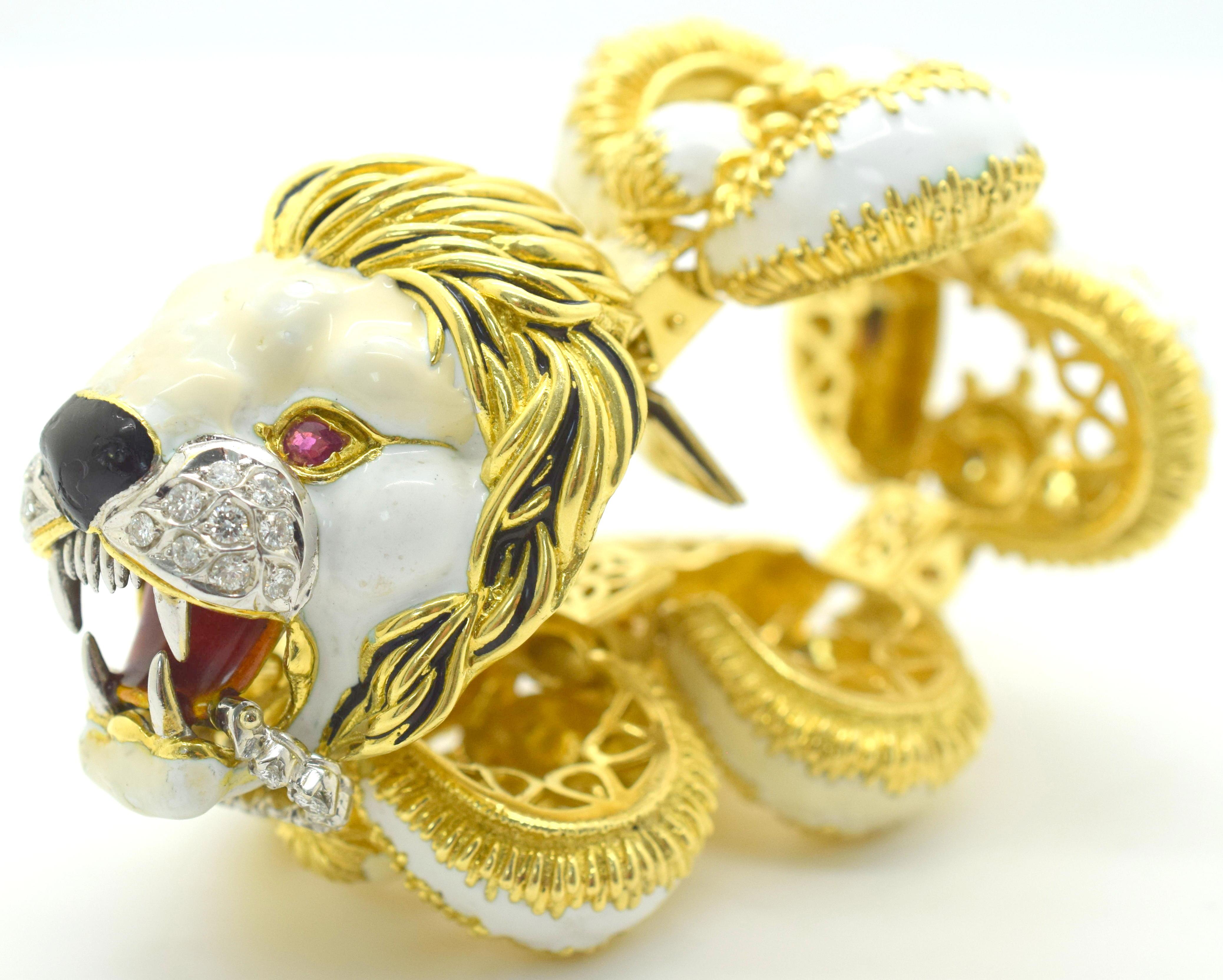 Gorgeous detail on this Franscarolo enamel Diamond & Ruby gold lion bracelet. Details on this piece are phenomenal. Four exquisite oval links are crafted in 18k yellow gold with enamel seen throughout. Interlocking claw designs are seen through each