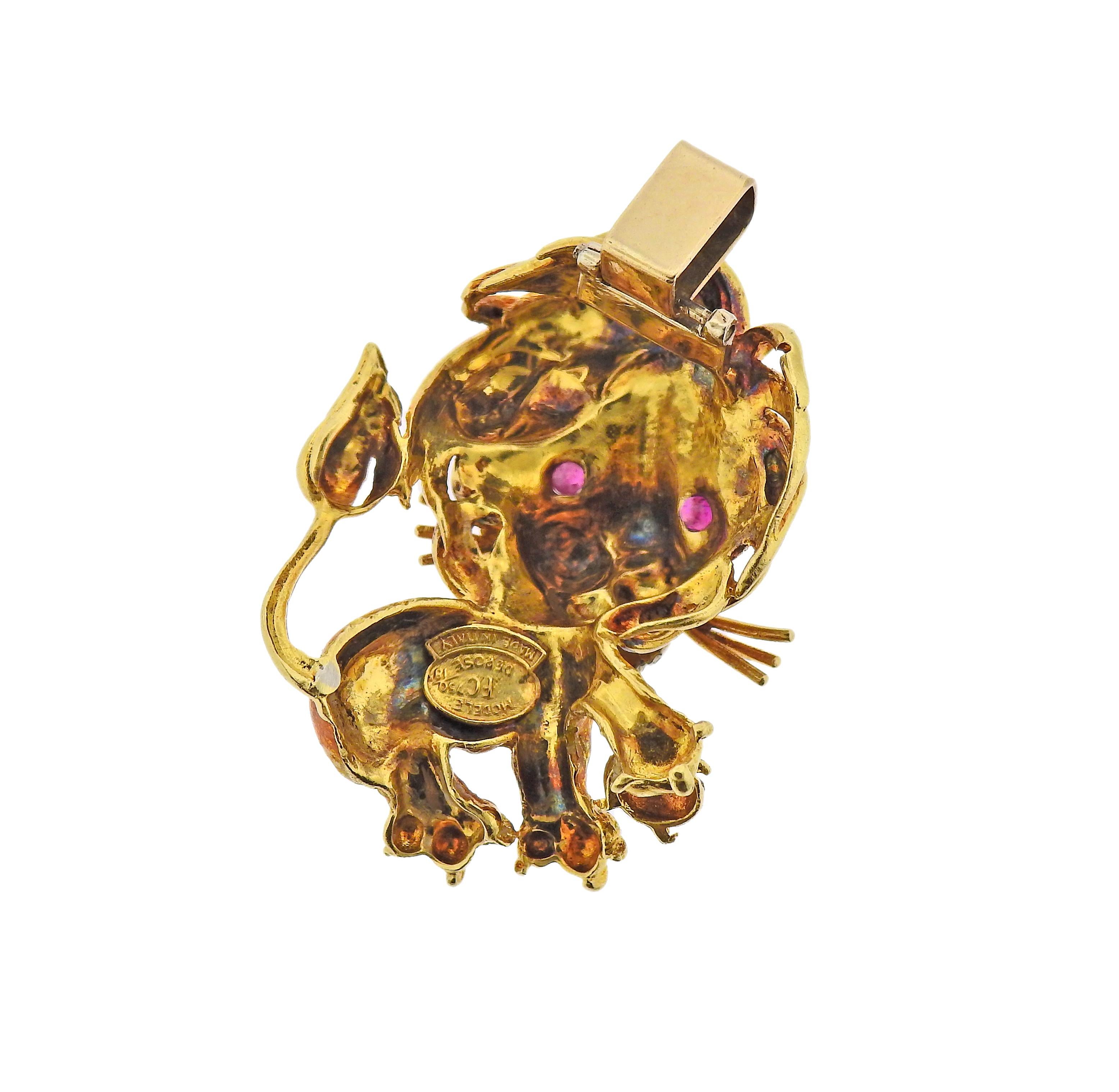 18k gold lion pendant by Frascarolo, with ruby eyes and diamonds on the beard. Pendant is 42mm x 30mm. Marked: FC mark, Modele Depose, 18ct, made in Italy. Weight - 19.3 grams. 