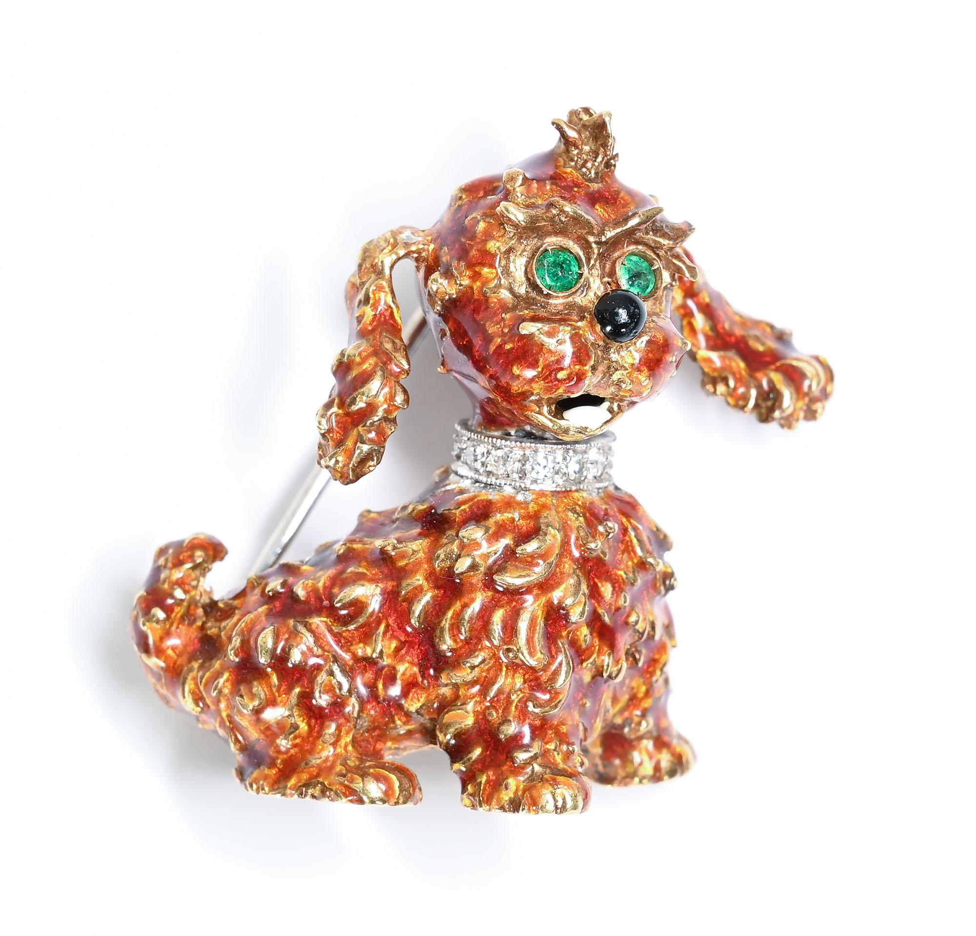 Could this pooch be any cuter? The poodle (?) has hair of red enamel; emerald eyes; a black onyx nose and a diamond collar. Long, waving ears are indicative of his (or her) playful character. The brooch measures 1 1/8 inches wide and 1 1/2 inches