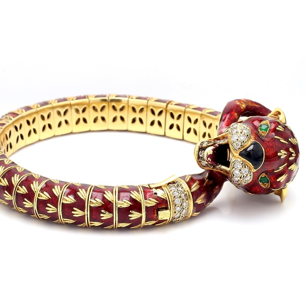 Frascarolo, 18K yellow gold and red enamel, panther head bracelet. Bracelet is set with sixty-five (65) round brilliant cut diamonds weighing approximately 1.00ctw. Hinge, clasp, and safety latch are in working condition. Bracelet weighs 123.3 grams