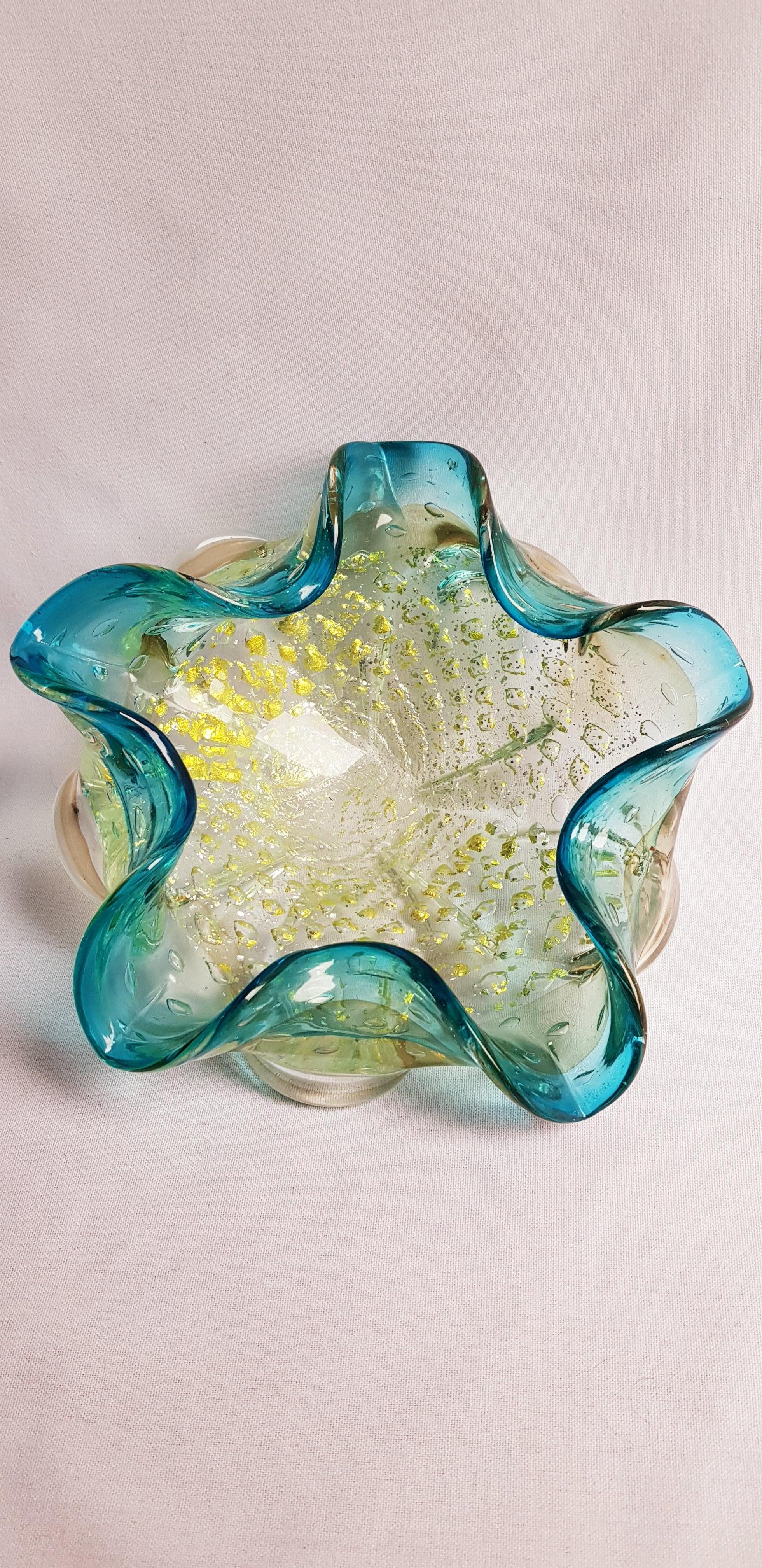 Beautiful middle of century Murano glass bowl with gold and silver leaf and controlled bubbles by Frateli Toso brilliant condition.