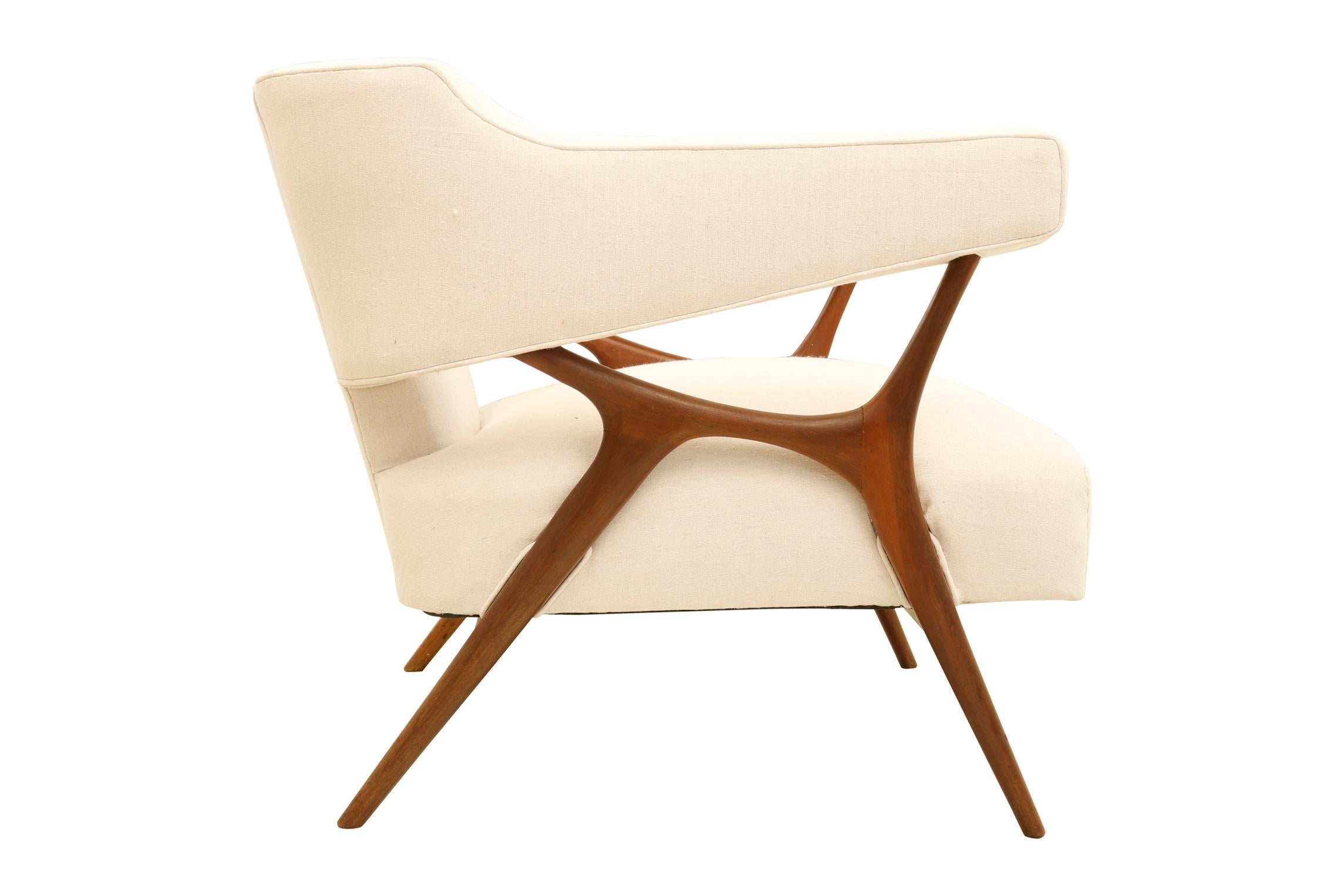 Contemporary Italian armchair bold silouhette and modern lines.