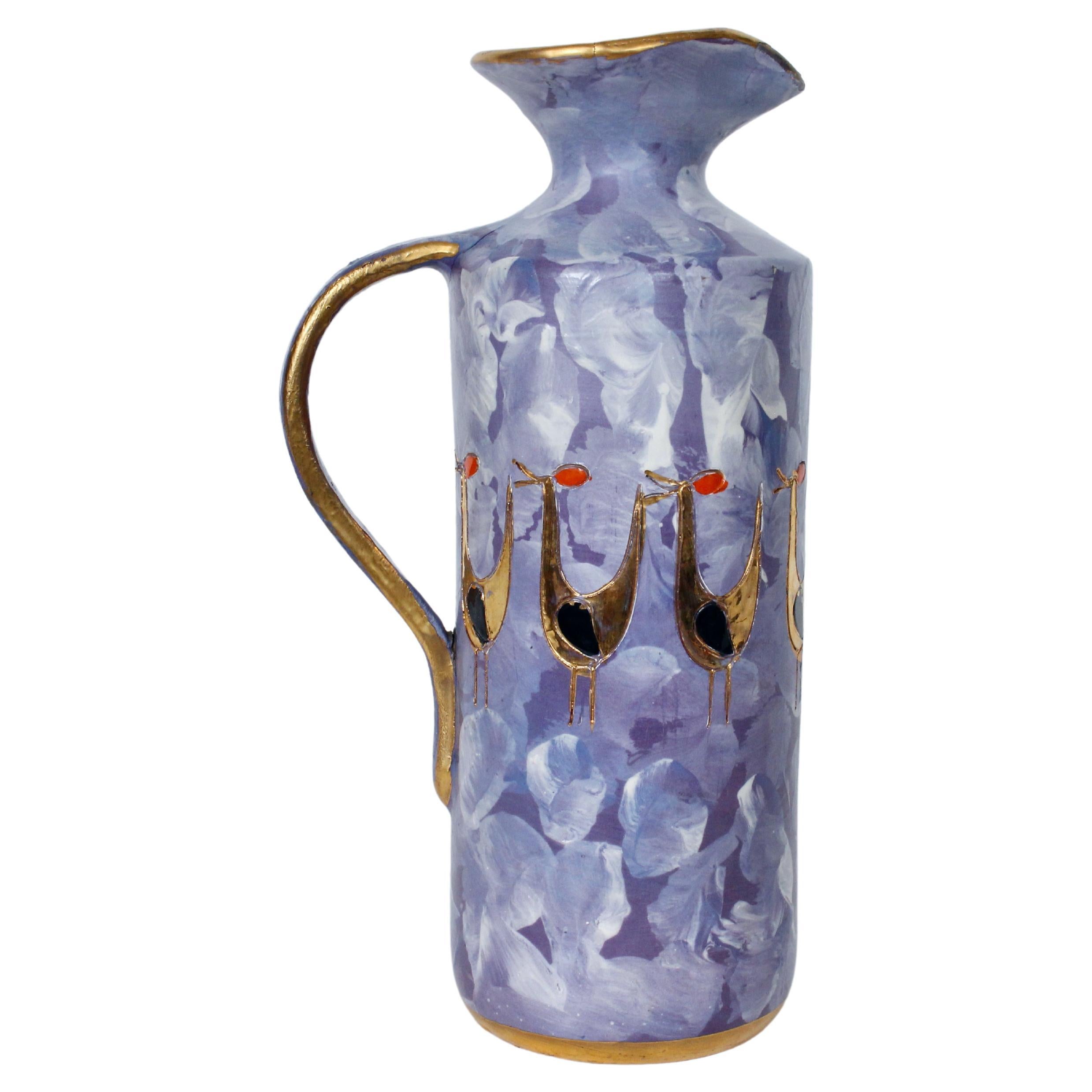 Aldo Londi per Bitossi Brocca blu con manico in ceramica dorata a forma di uccello