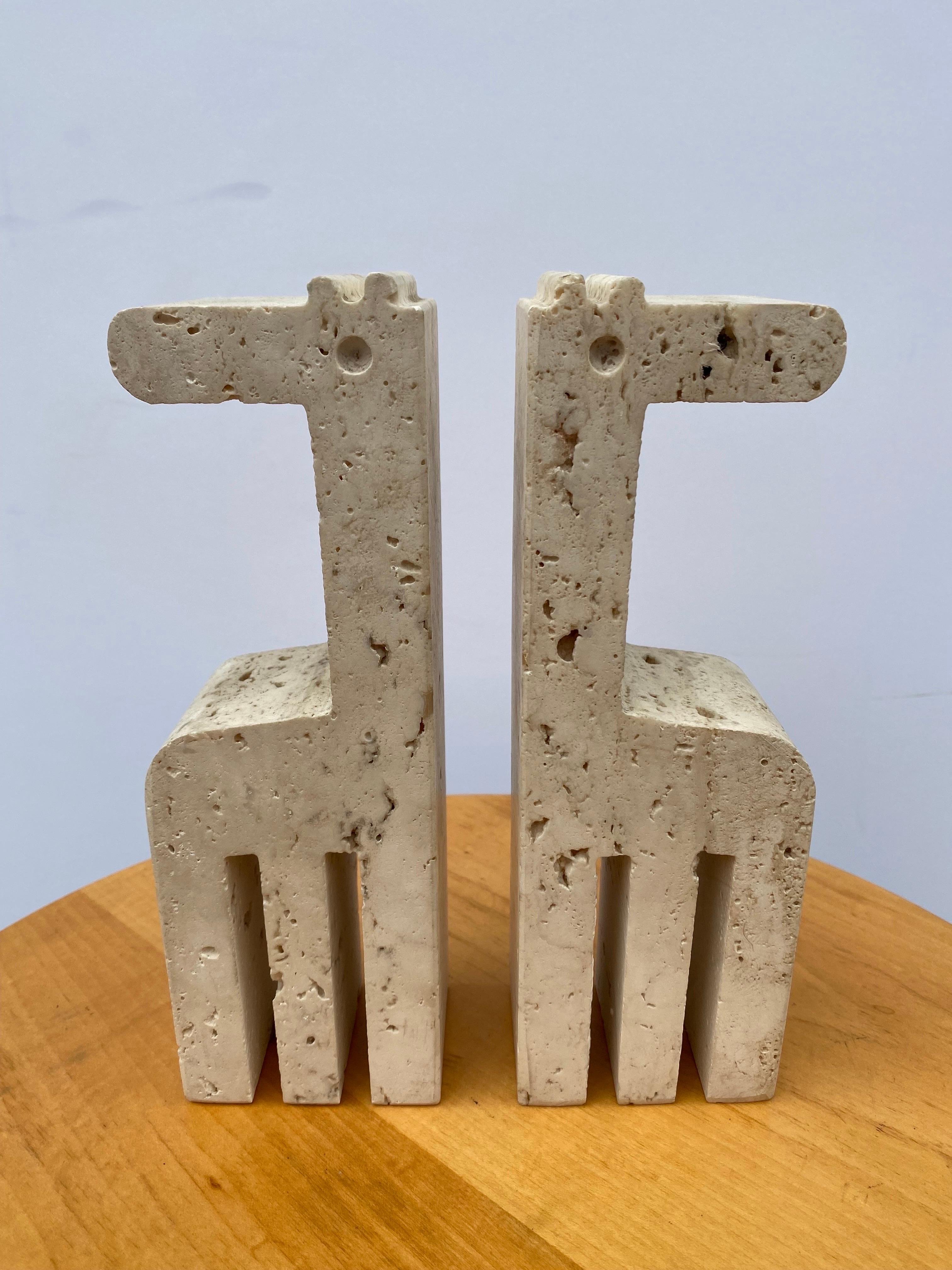 Fratelli Mannelli Travertine Bookends. Very nice Condition, partial labels still attached as seen in photos. Nice Scale and minimalist Design to these functional pieces of art!.