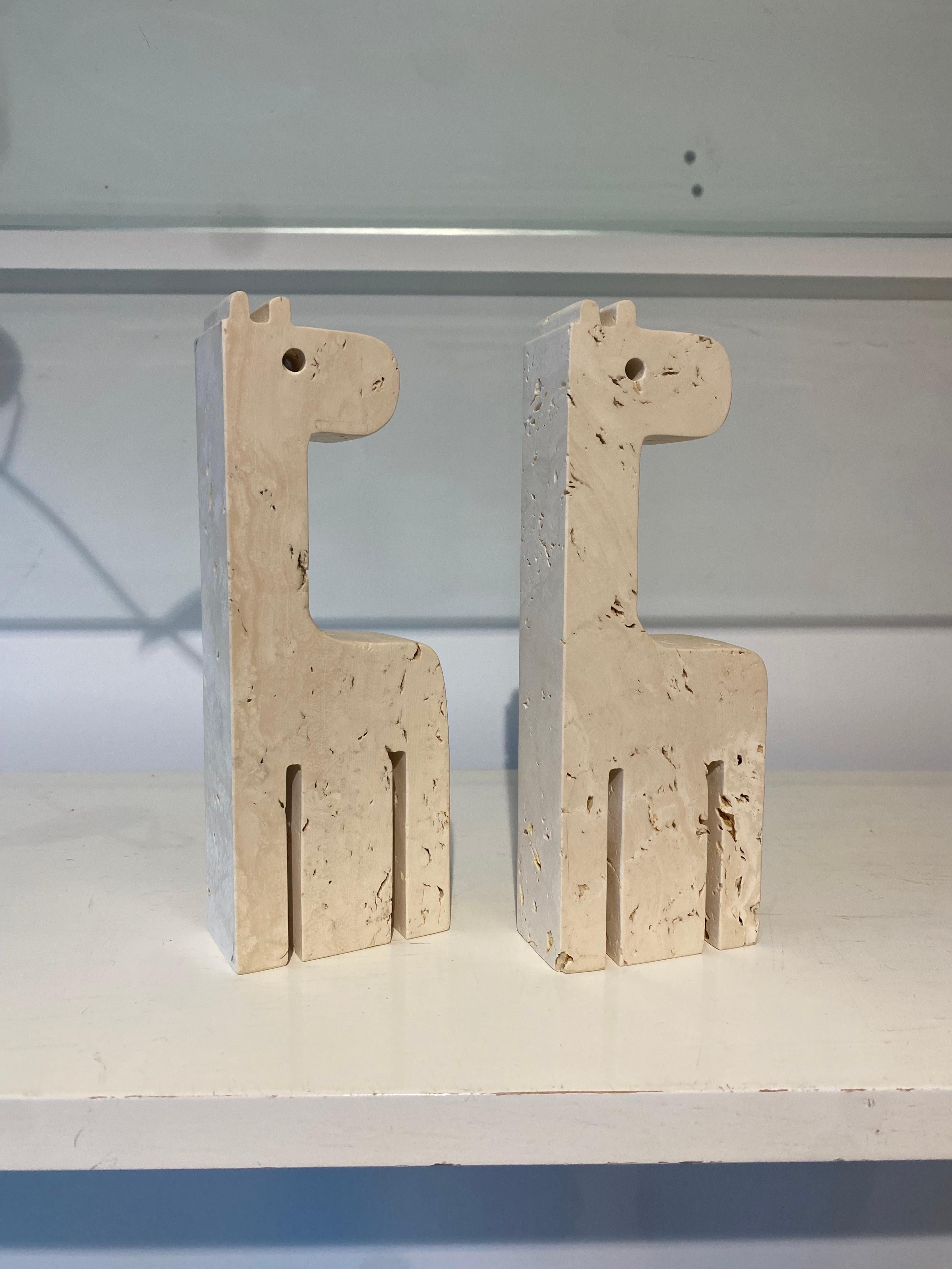 Sculpted travertine giraffe pair by Fratelli Mannelli of Italy, circa the 1970’s. 

In excellent condition. 

Slight variance in size between the two due to the handmade nature.