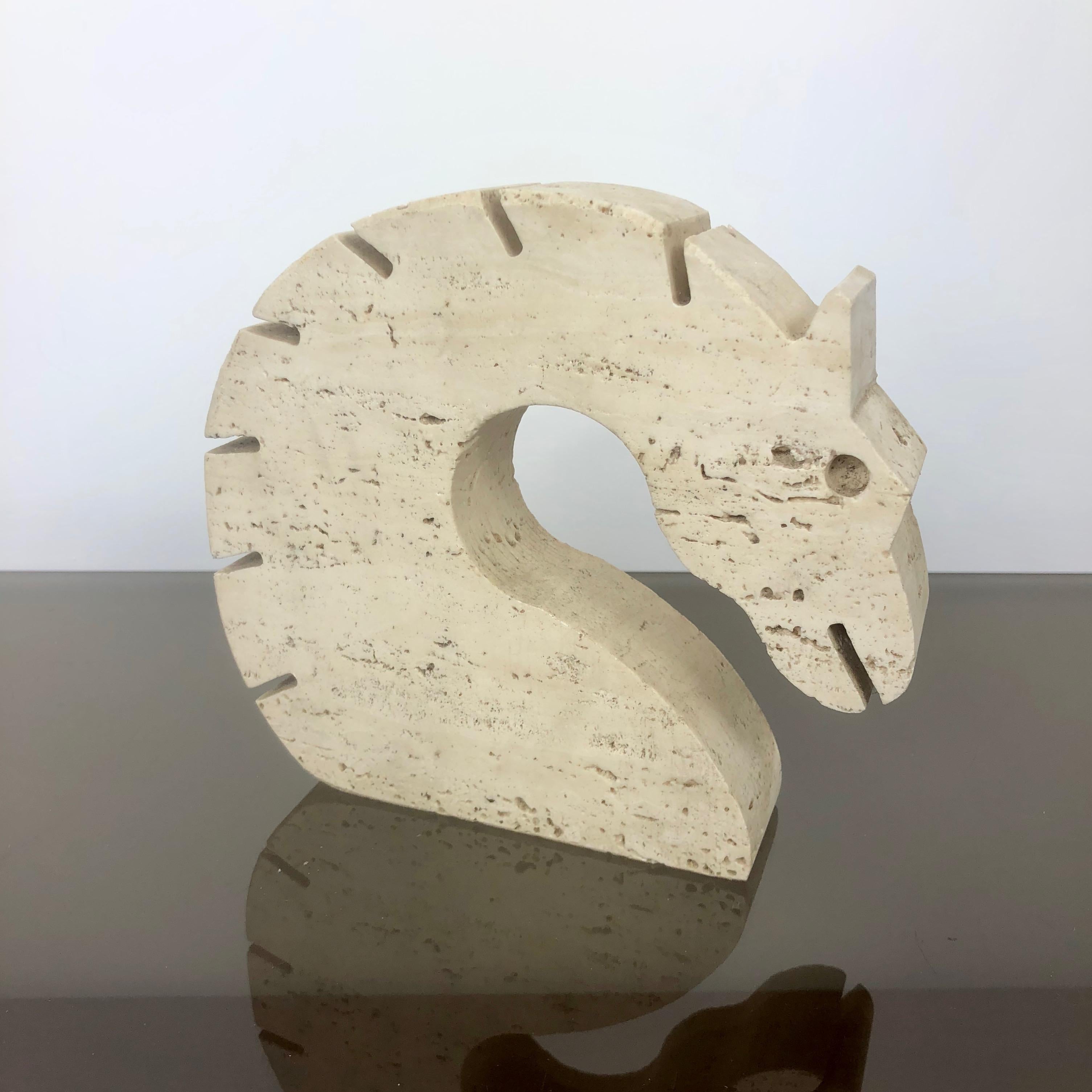 Letter holder or paperweight in travertine in the shape of a horse made by the Italians Fratelli Mannelli.
 