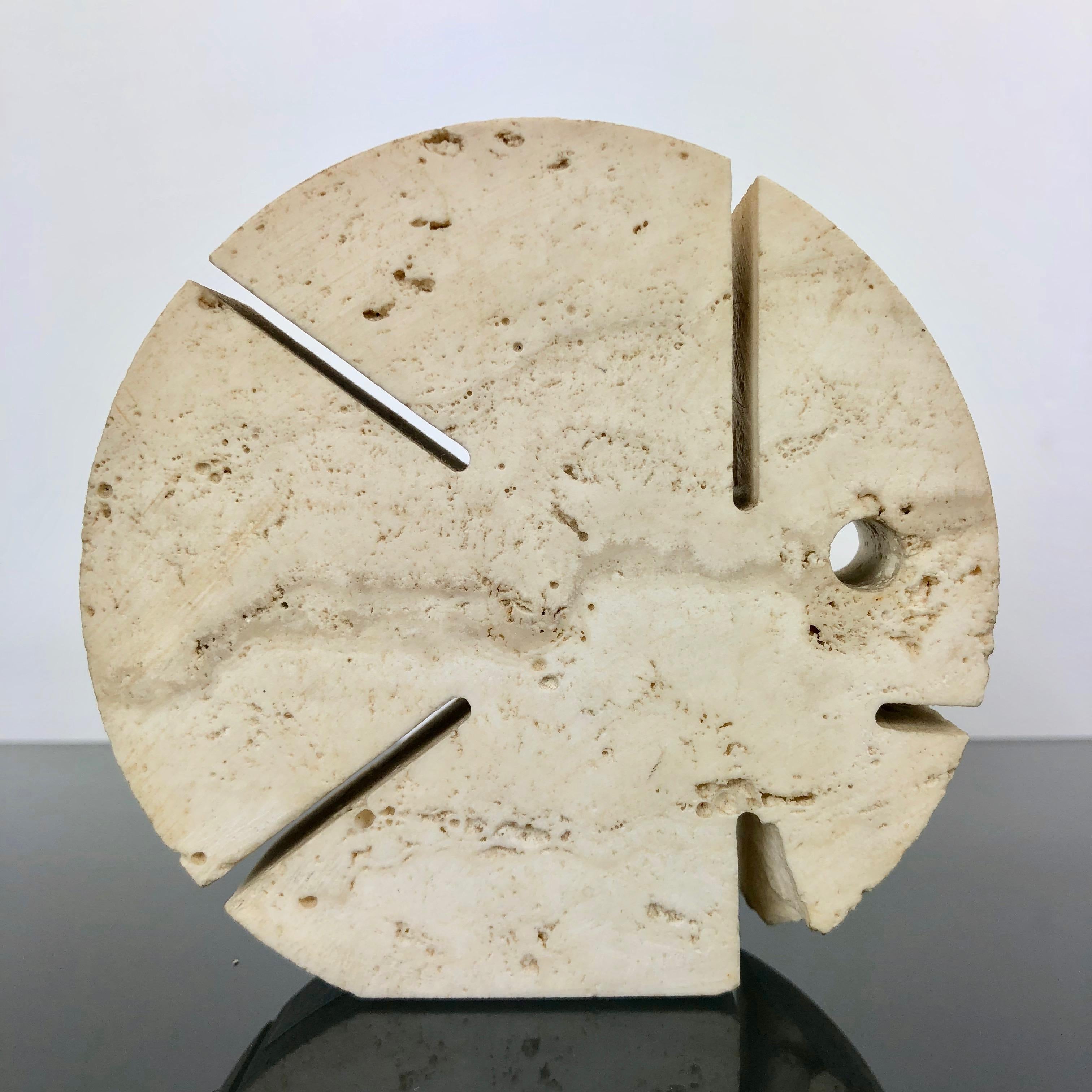 Letter holder or paperweight in travertine in the shape of a puffer fisher made by the Italians Fratelli Mannelli. 
The sculpture has its original label on the bottom. 
As the photos show, there is a tiny chipping down on one side.