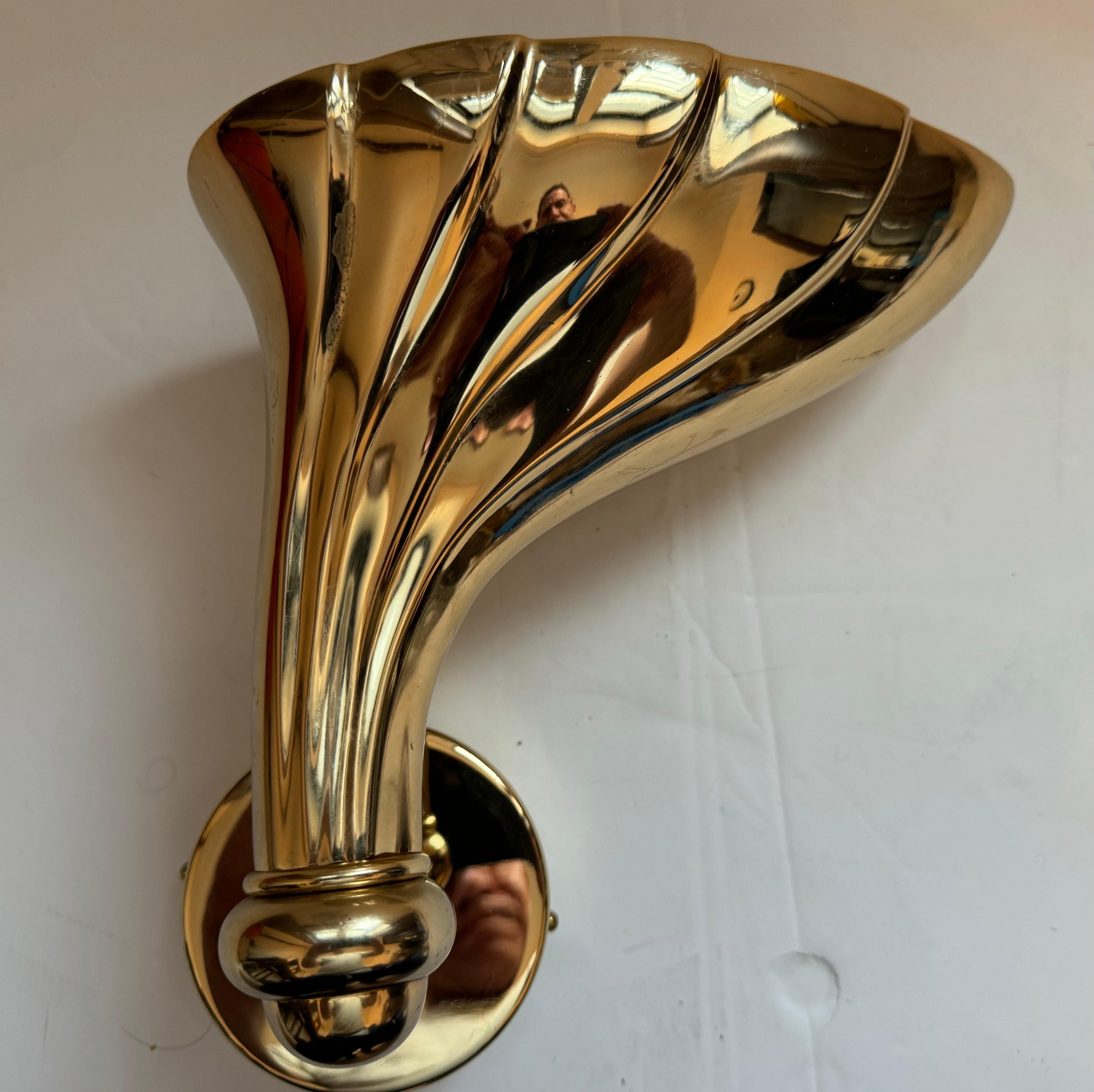A rare polished bronze sculptural Italian 1980s wall lamp by Fratelli Martini. A complimentary looking other pair available.