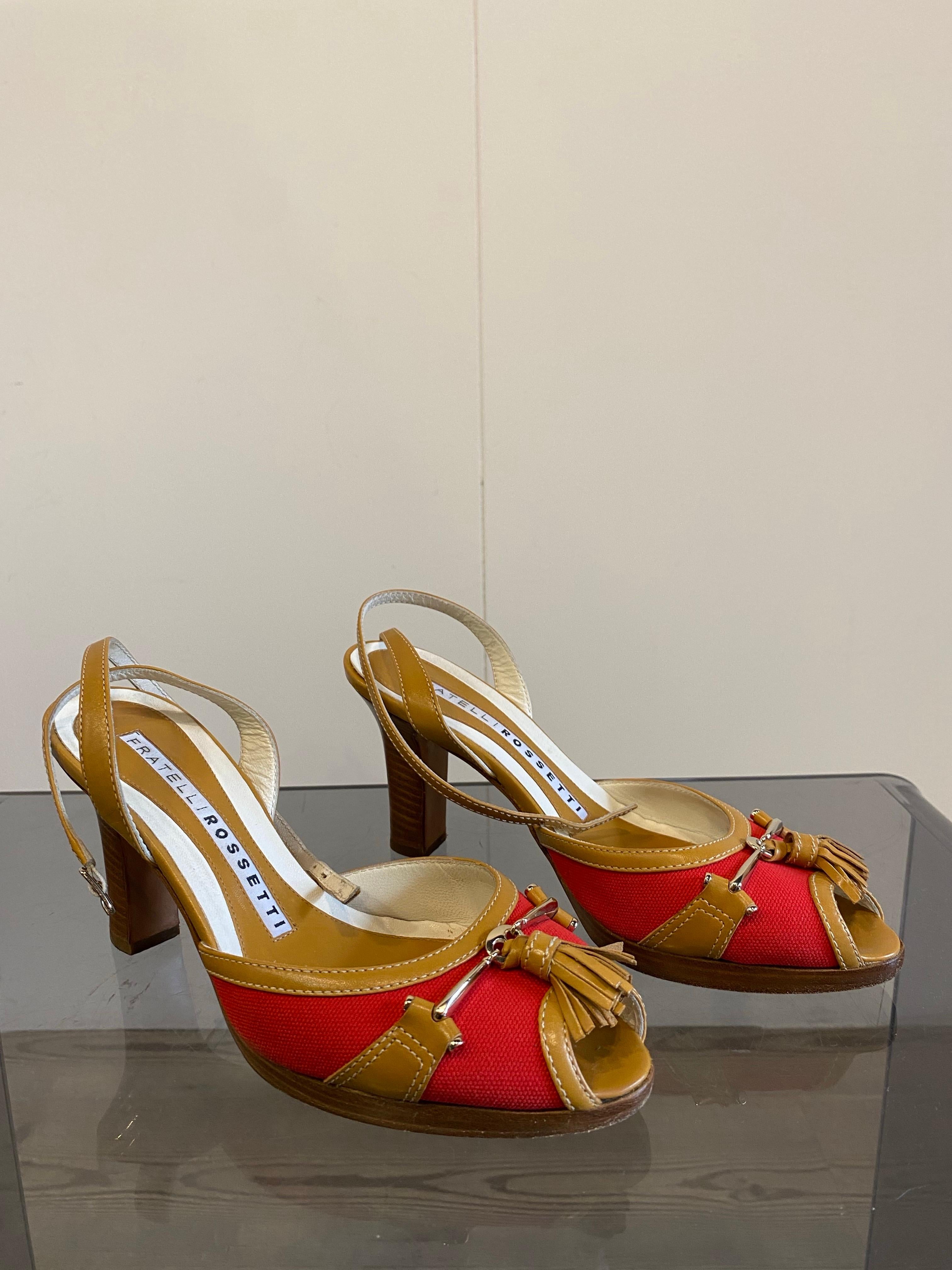 Fratelli Rossetti red and ochre sandals with tassel and silver detail / size 36 / 8cm heel / 24cm insole. Original box. They show some signs of use.