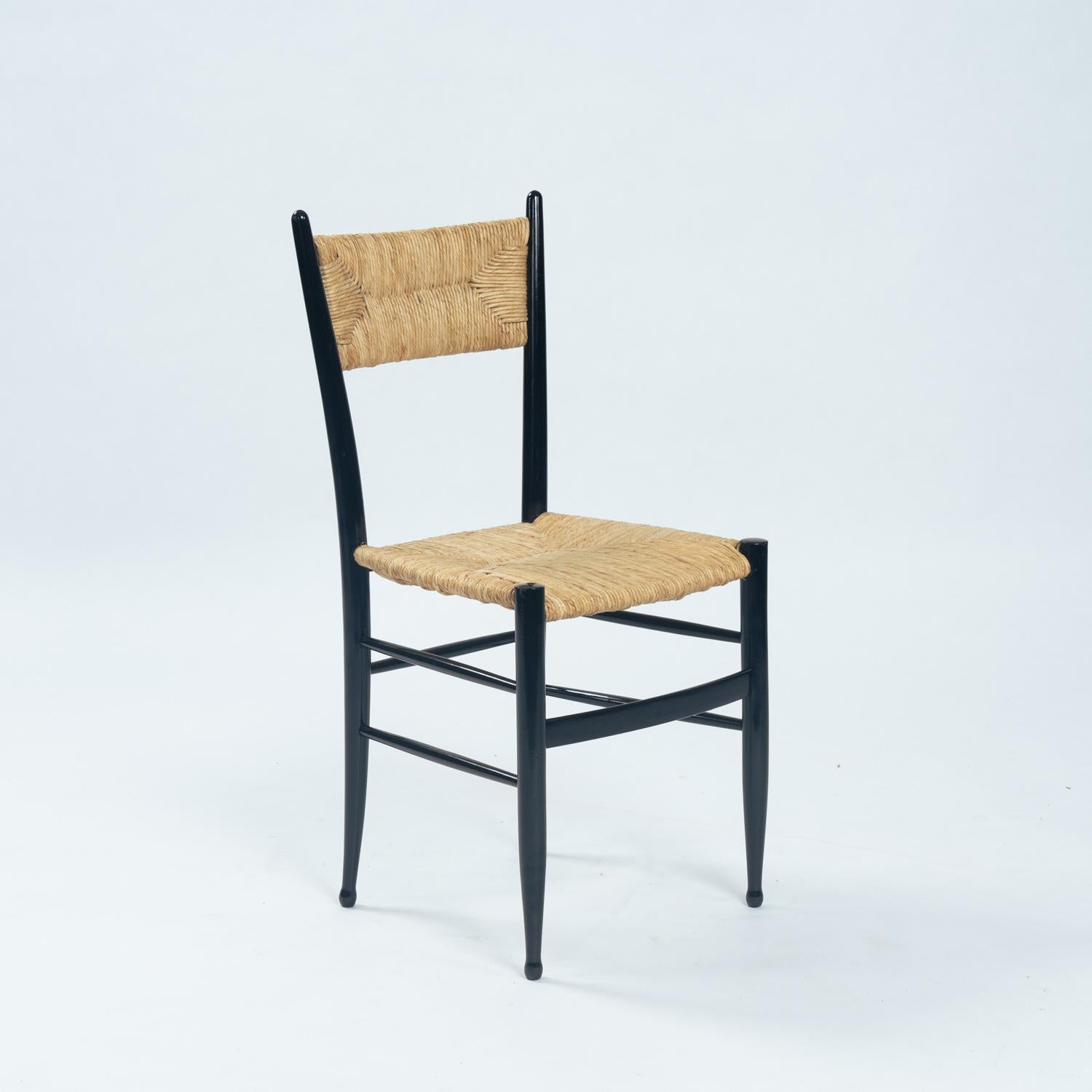 Mid-20th Century Fratelli Spinetto Chiavari Dining Chairs in black ebonized Wood, Straw, Italy For Sale