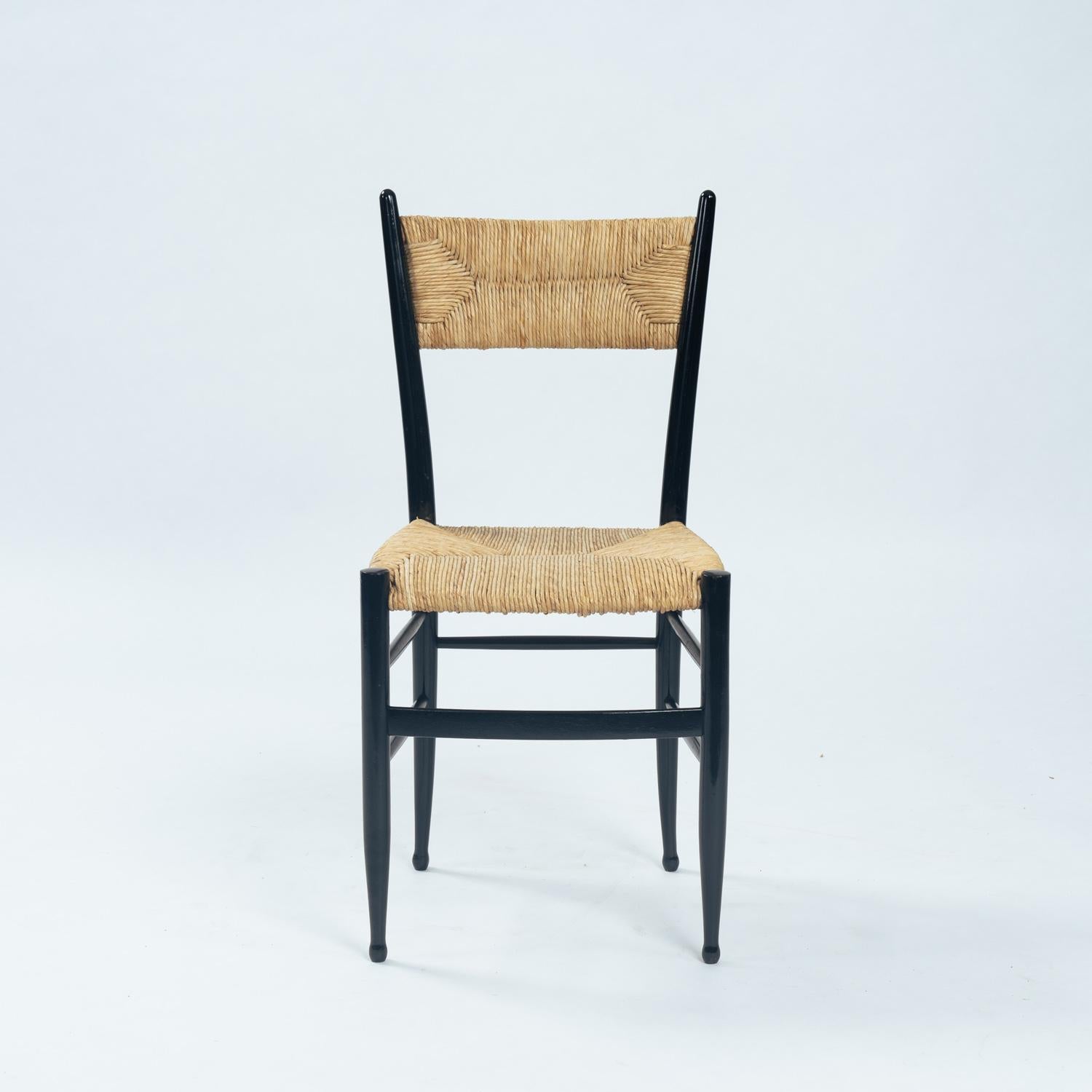 Fratelli Spinetto Chiavari Dining Chairs in black ebonized Wood, Straw, Italy For Sale 1
