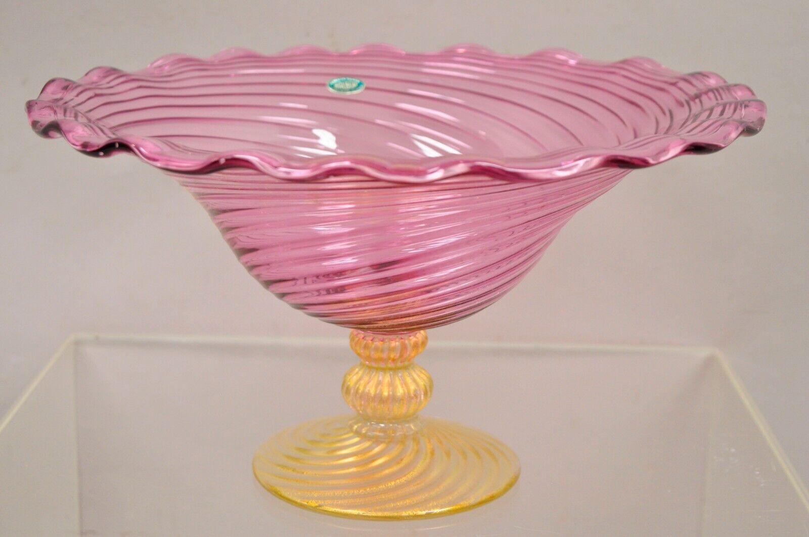 Fratelli Toso Balboa Venetian blown art glass pink swirl gold flecks fruit bowl. Item features a gold flecks pedestal base, pink blown art glass, swirl design, original label, very nice vintage item, great style and form, design by Fratelli Toso.