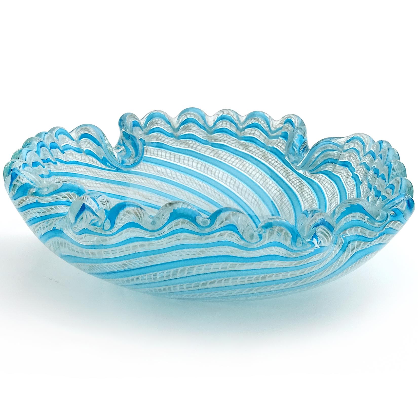 Beautiful vintage Murano hand blown blue ribbons, white Zanfirico with aventurine Italian art glass decorative bowl. Documented to the Fratelli Toso Company. The piece has a scalloped rim, with squared shape and folded in corners. Can be used as a