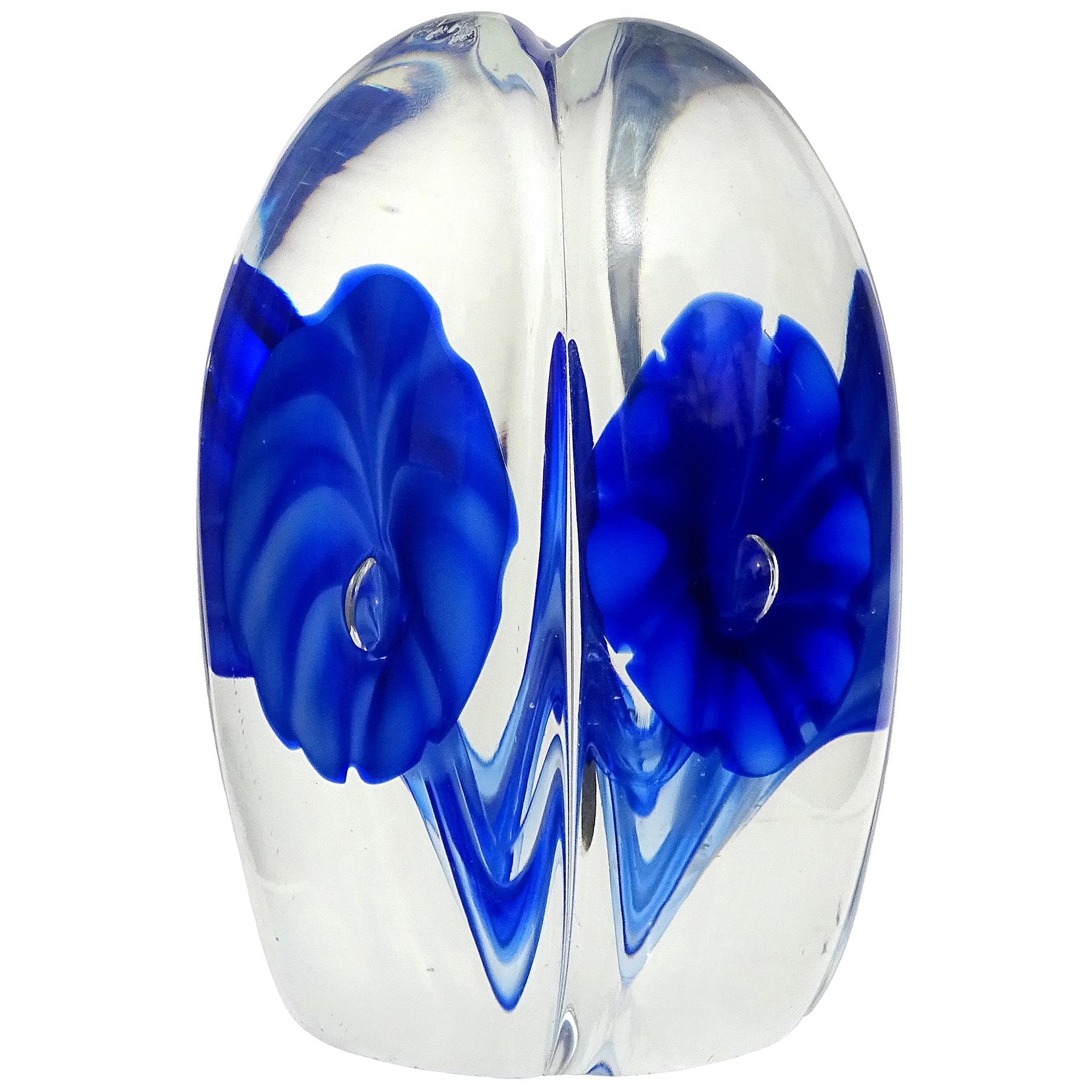Beautiful vintage Murano hand blown cobalt blue flowers Italian art glass paperweight. Documented to the Fratelli Toso company. It still retains an original, but worn 