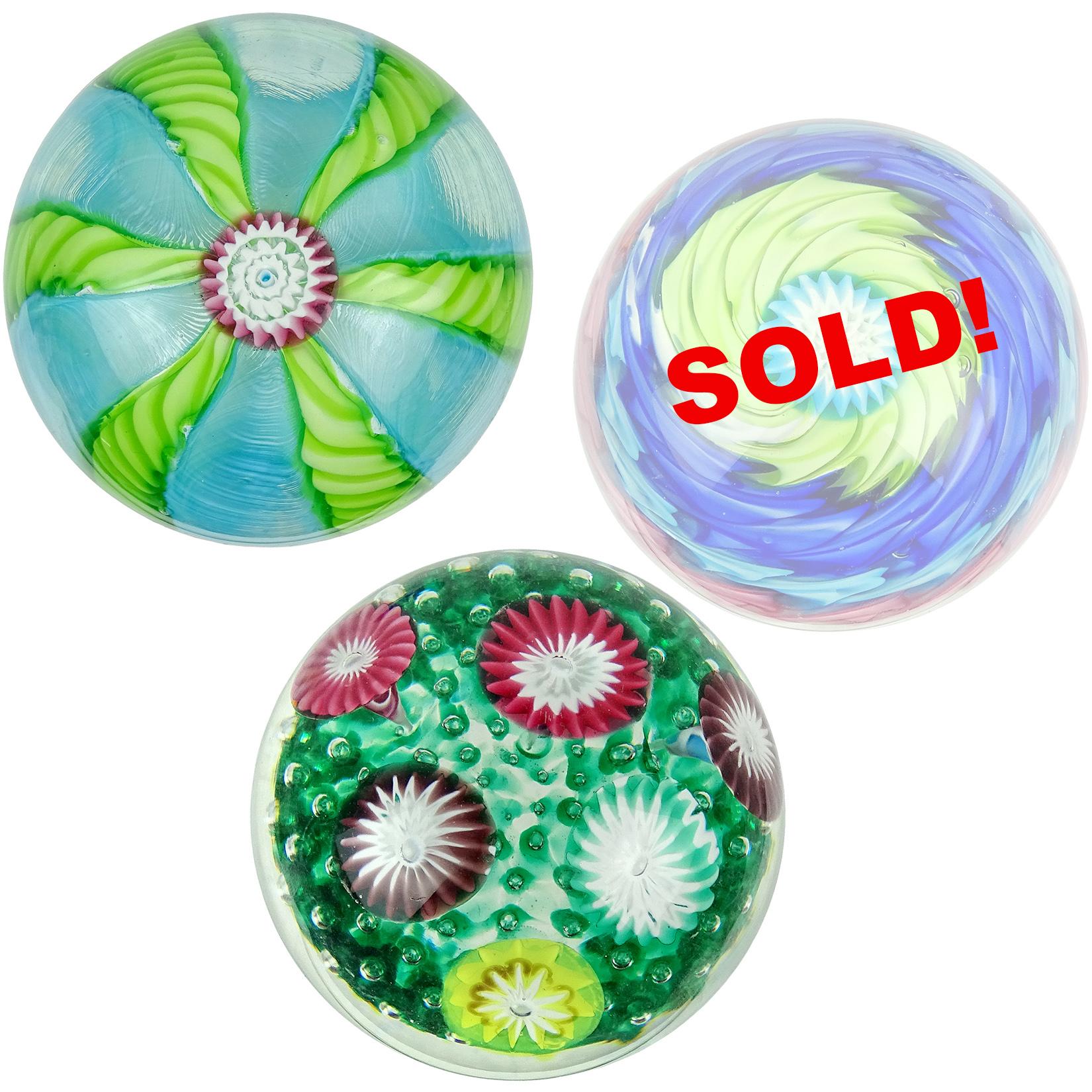 Priced per item - Only 2 Left! Beautiful and colorful vintage Murano hand blown Italian art glass paperweights. Documented to the Fratelli Toso company. Each has their own unique design. The first one is a 