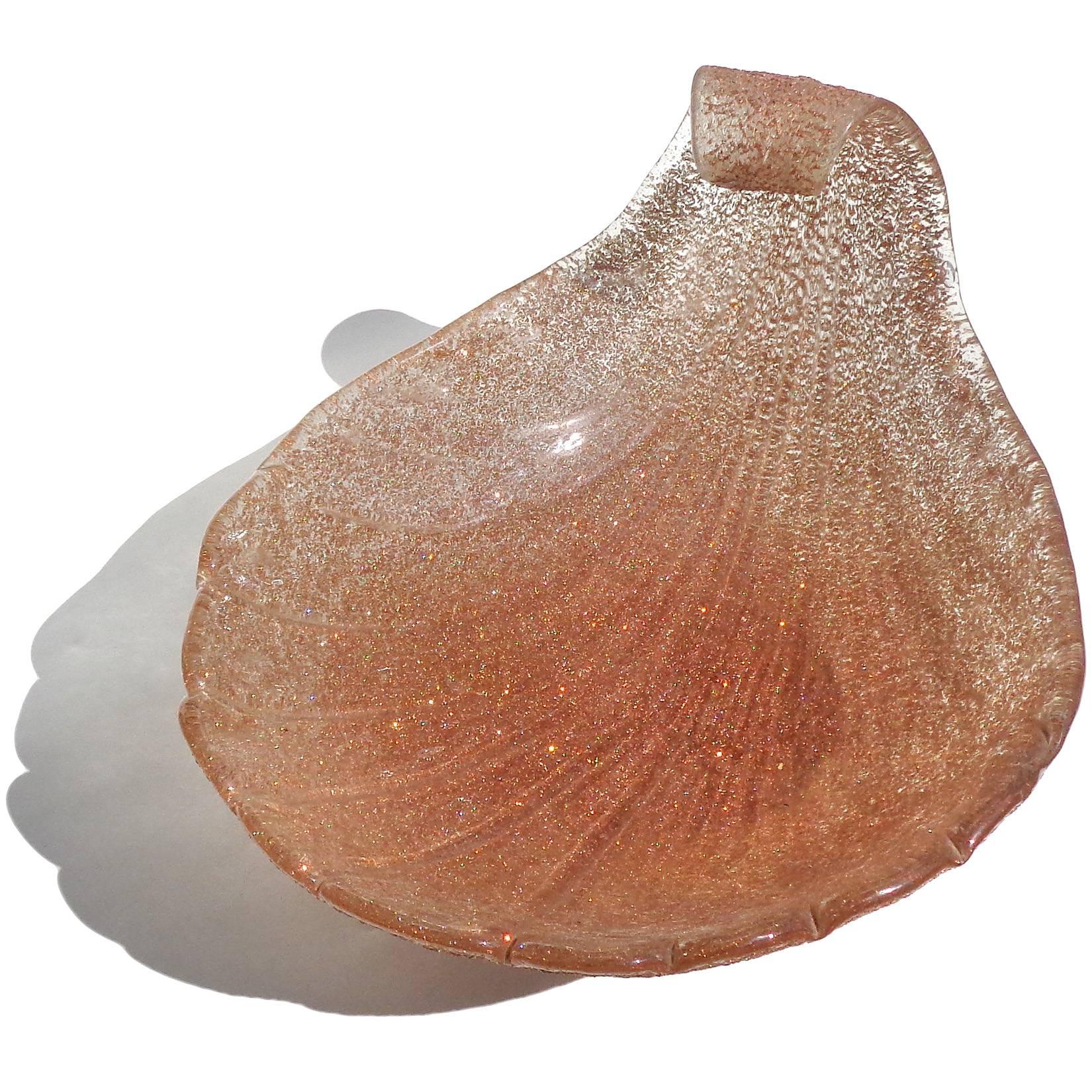 Very large Murano hand blown with glittery copper aventurine crushed glass surface Italian art glass conch shell centrepiece. Documented to Fratelli Toso, with Murano label still attached. The seashell shape is really beautiful, with a curl