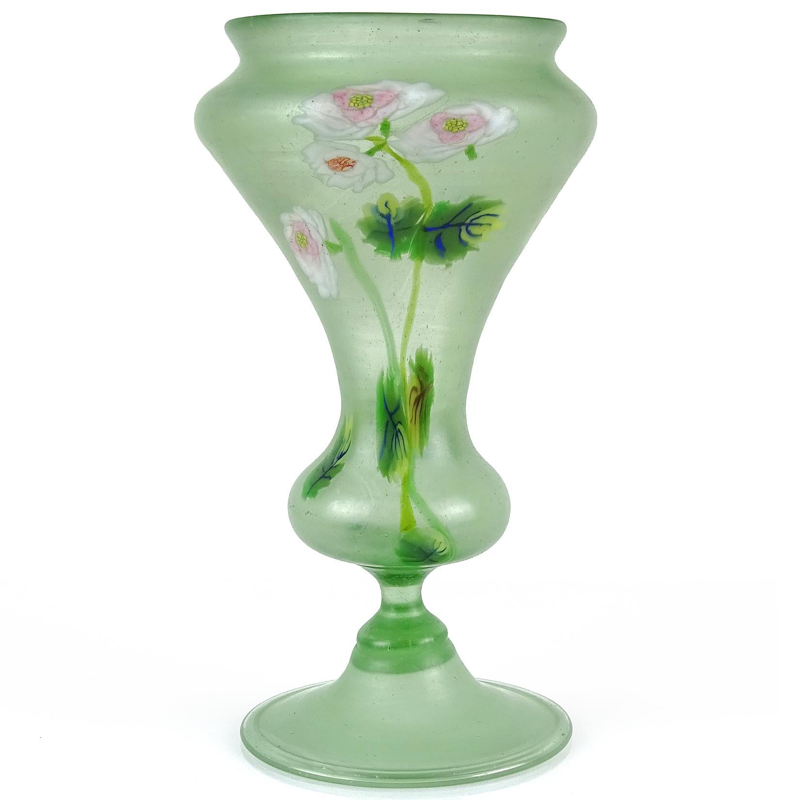 Gorgeous antique Murano hand blown light green Italian satin art glass millefiori flowers art glass decorative vase. Documented to the Fratelli Toso company. It has a unique shape and rare design, with white and pink roses and blue with yellow