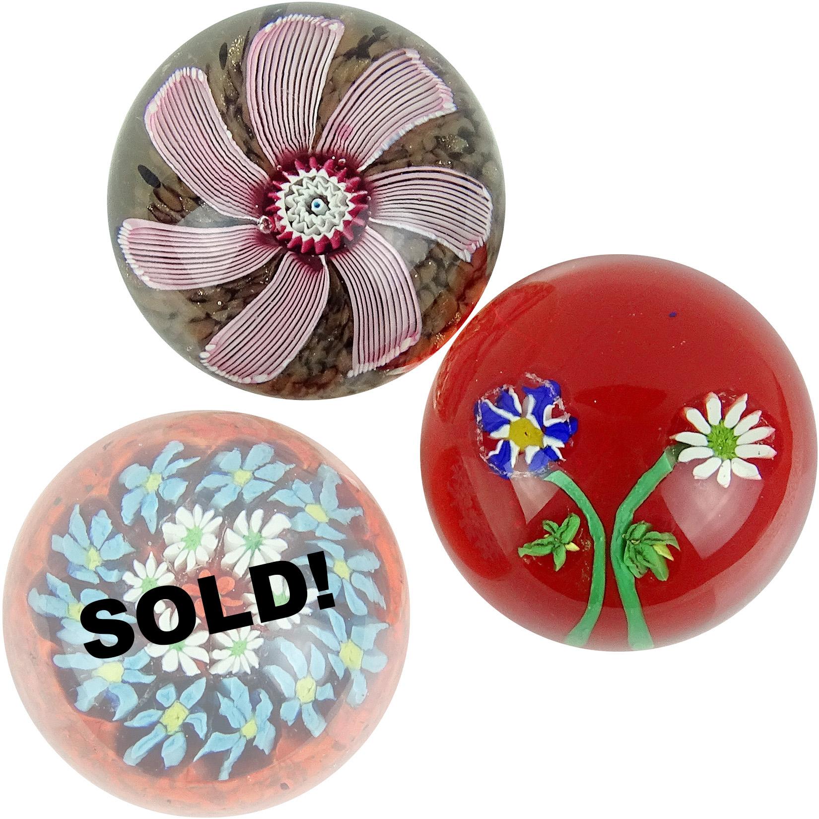 Priced Individually (2 left!). Beautiful Murano hand blown flower design Italian art glass paperweights. Documented to the Fratelli Toso Company. The 2 paperweights left are the top one, with pink and white fanned out petals, and copper aventurine