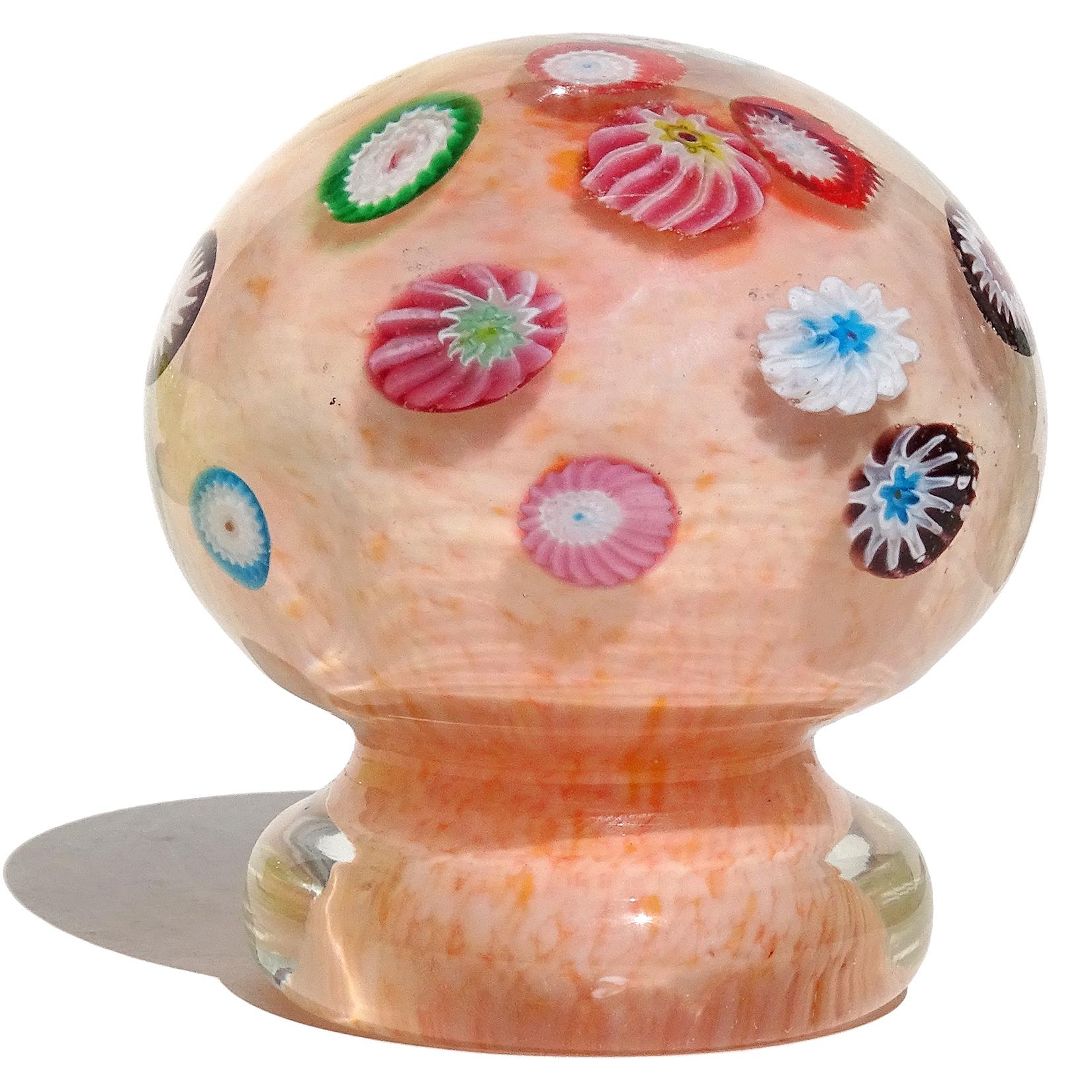 Beautiful vintage Murano hand blown millefiori flower design Italian art glass mushroom / toadstool paperweight. Documented to the Fratelli Toso company. The paperweight has flower murrine pieces floating inside the piece, in a rainbow of colors.