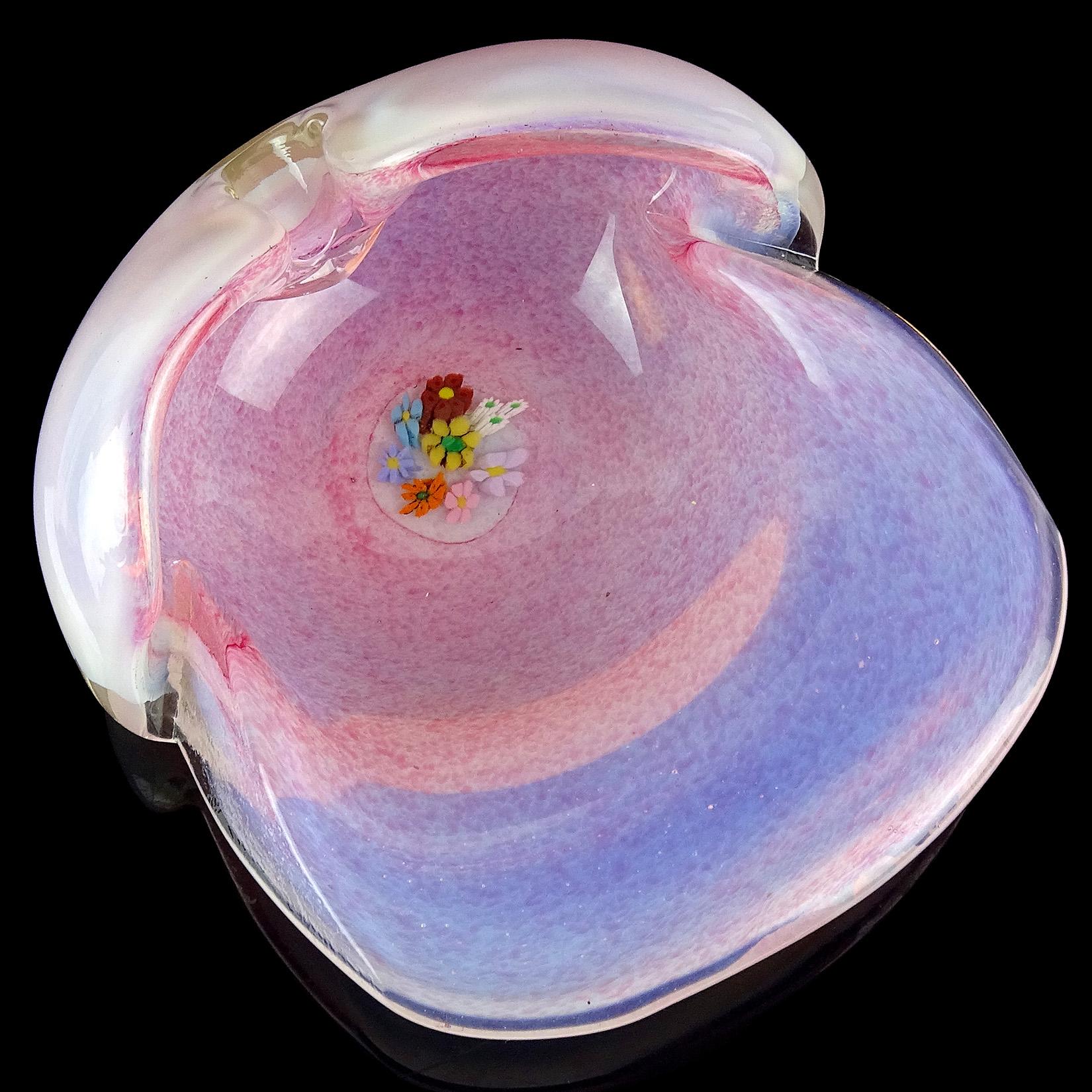 Beautiful Murano hand blown pink spots over white opalescent Italian art glass orchid shaped bowl with wild flower murrines. The piece is documented to Fratelli Toso. Would make a perfect jewelry / ring dish for a vanity. Very unusual design.