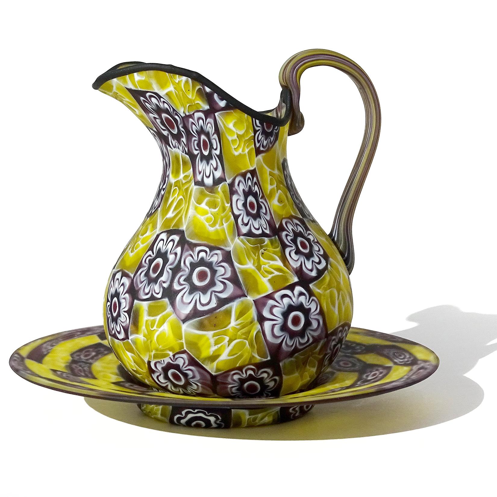 Beautiful antique Murano hand blown large Millefiori Murrina flower mosaic Italian art glass water pitcher and under plate. Documented to the Fratelli Toso company, circa 1910-1930. The pitcher is made of bright yellow and white honeycomb murrines,
