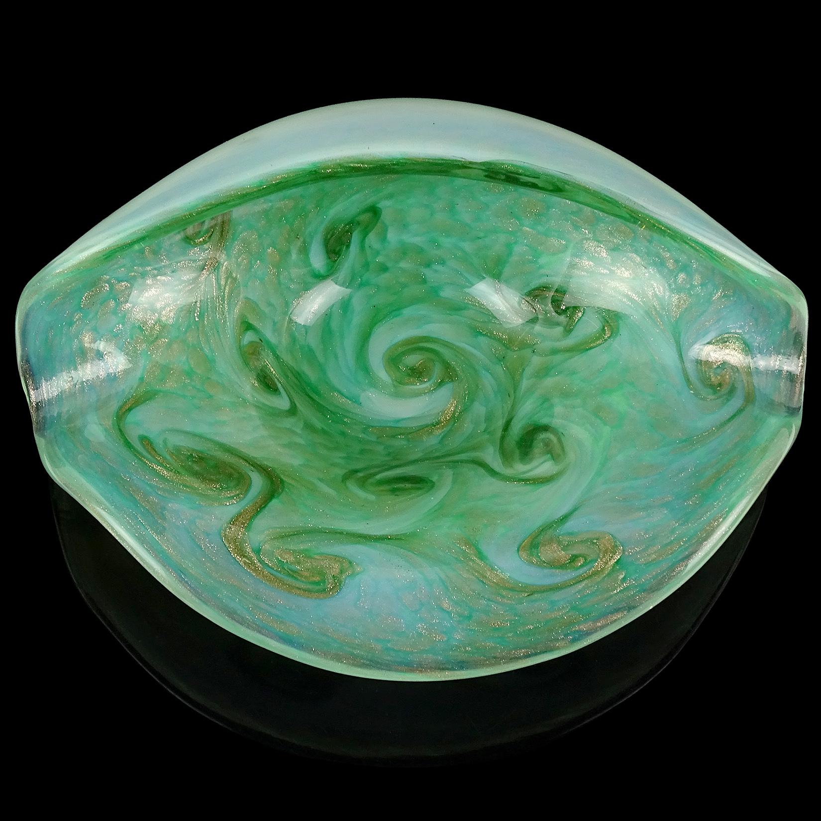 Beautiful Murano hand blown opalescent white, green and copper aventurine swirls Italian art glass bowl. Documented to the Fratelli Toso Company, in the 