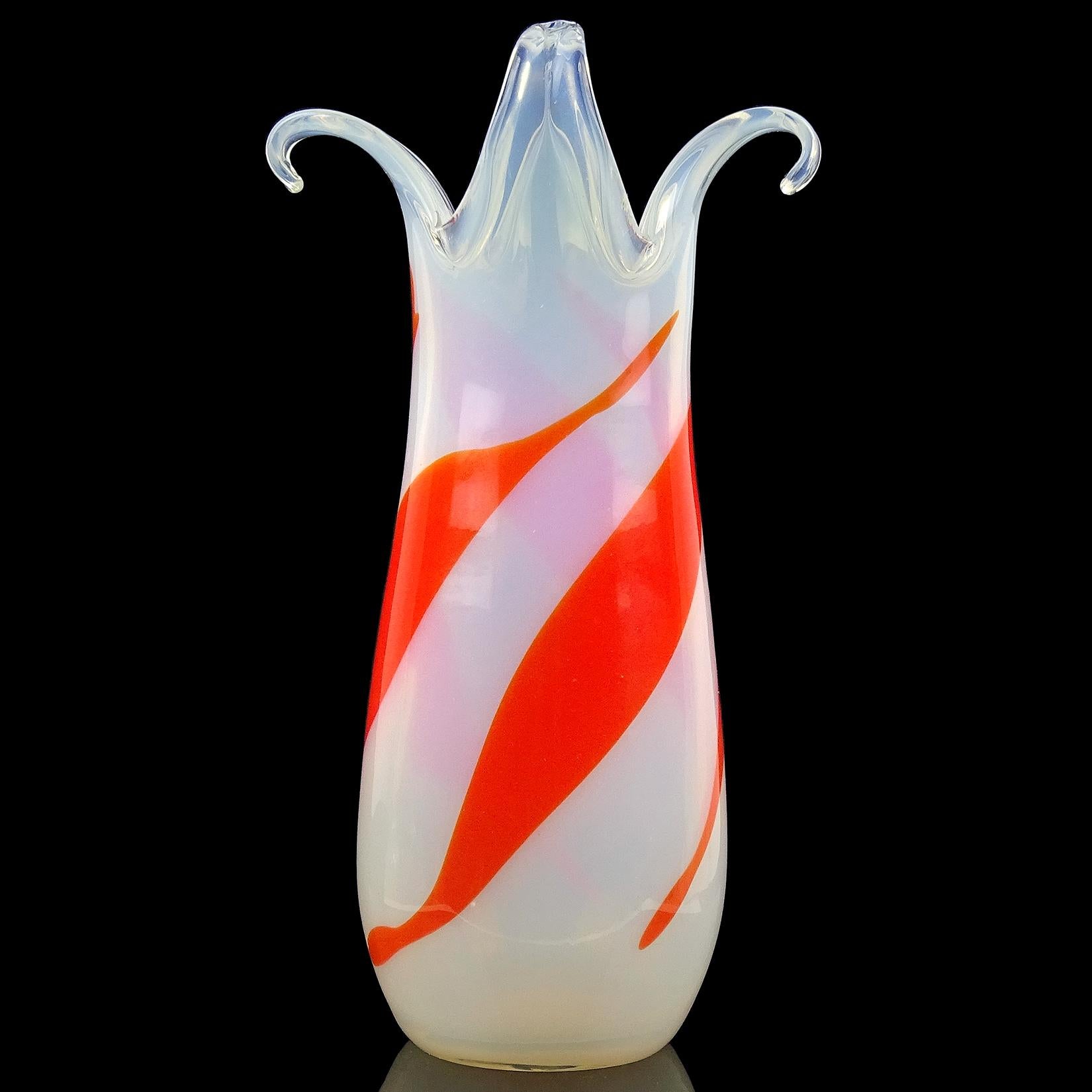 Beautiful vintage Murano hand blown opalescent and bright orange Italian art glass flower vase. Documented to the Fratelli Toso workshop. The vase still retains an original 