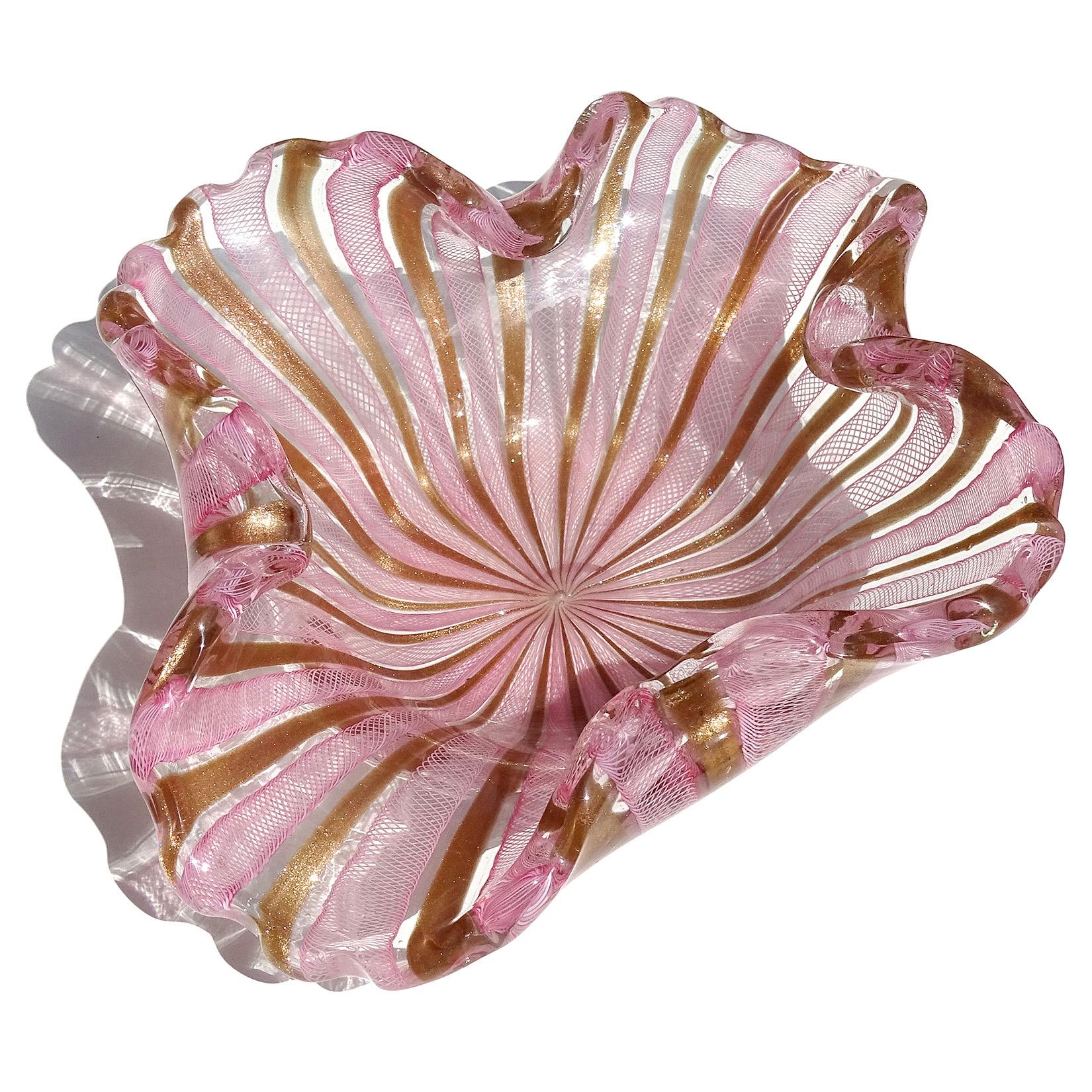 Beautiful and large, vintage Murano hand blown pink Zanfirico ribbons and copper aventurine bands Italian art glass decorative centerpiece bowl. Documented to the Fratelli Toso company. Has a ruffled and folded rim. Very intricate tight net design