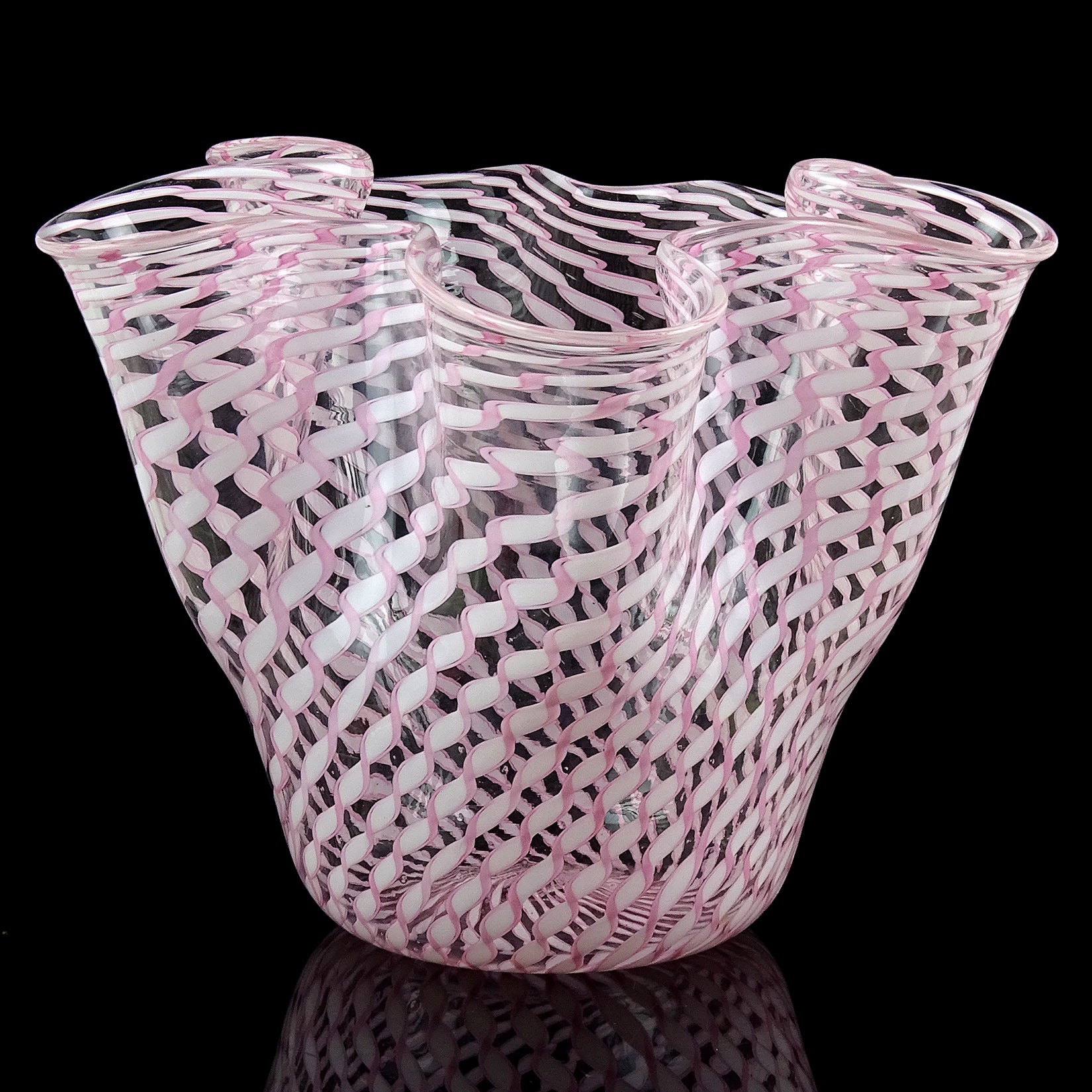 Beautiful vintage Murano hand blown pink and white twisted ribbons Italian art glass handkerchief / fazzoletto vase. Documented to the Fratelli Toso company. Made with twisting latticing pieces and formed into a vase. Would make a great display