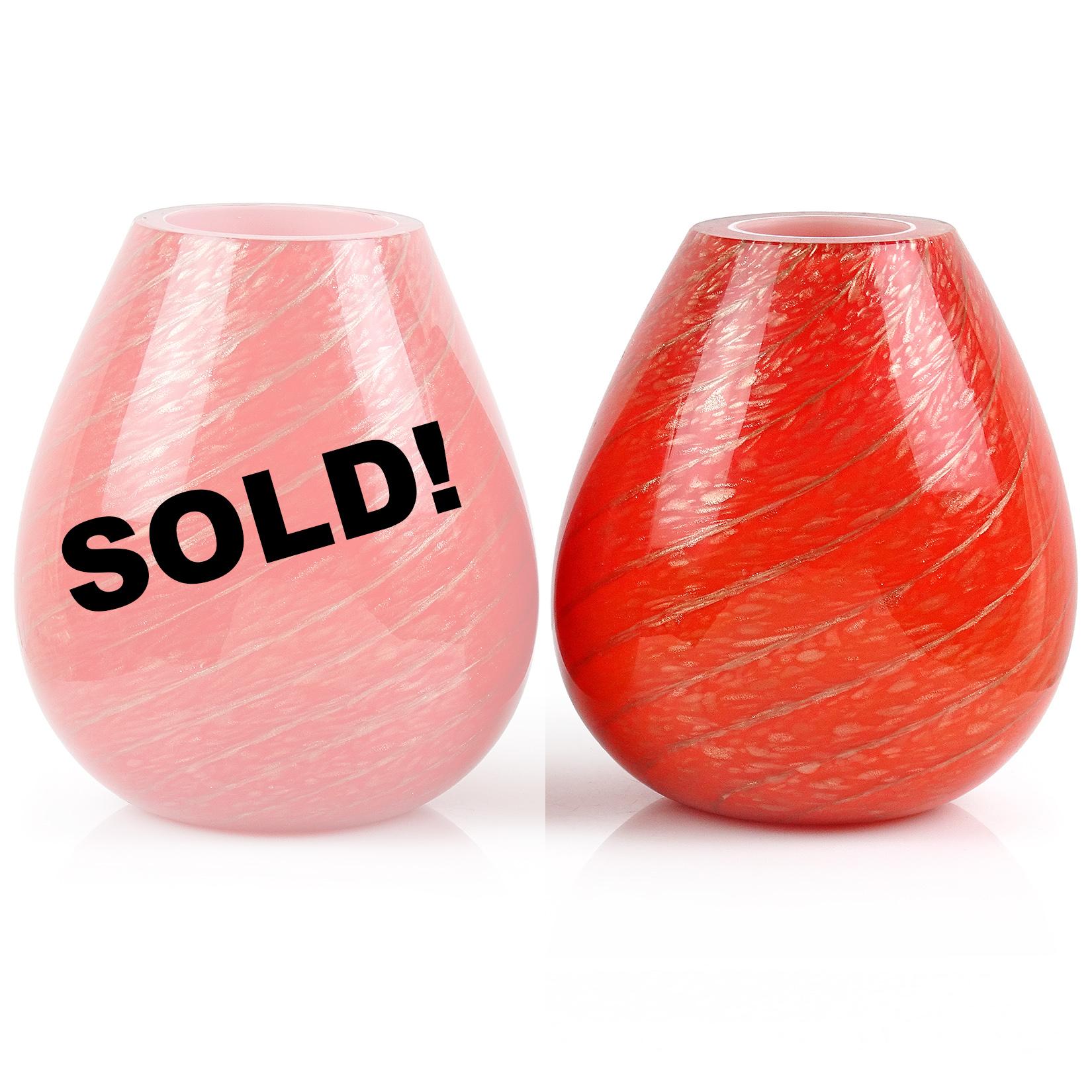 Only 1 Left! Beautiful vintage Murano handblown red over white, and aventurine Italian art glass flower vase. Documented to the Fratelli Toso Company. Published in their book (last photo). The vase has a candy cane swirl design with heavy copper