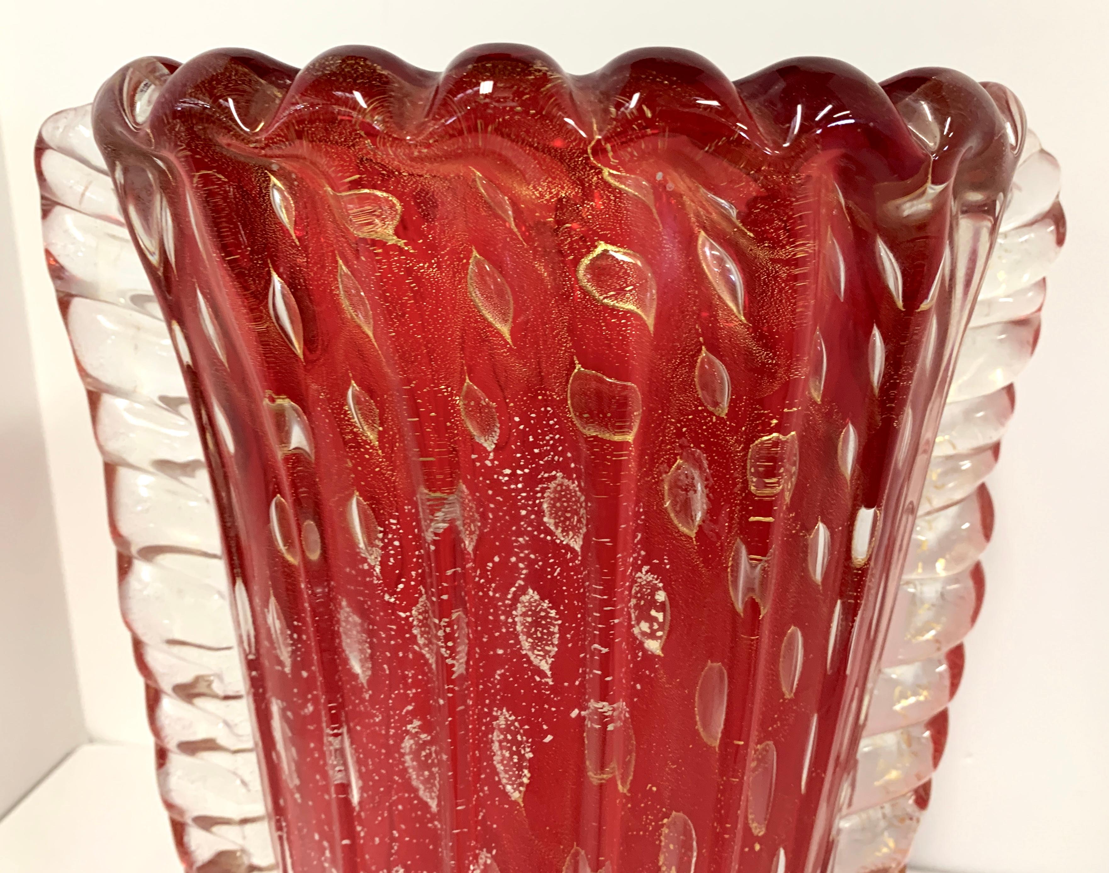 A vintage Fratelli Toso gold flaked glass vase. In good condition. 12 1/2 inches tall and 9 x 7 inches in dimension.