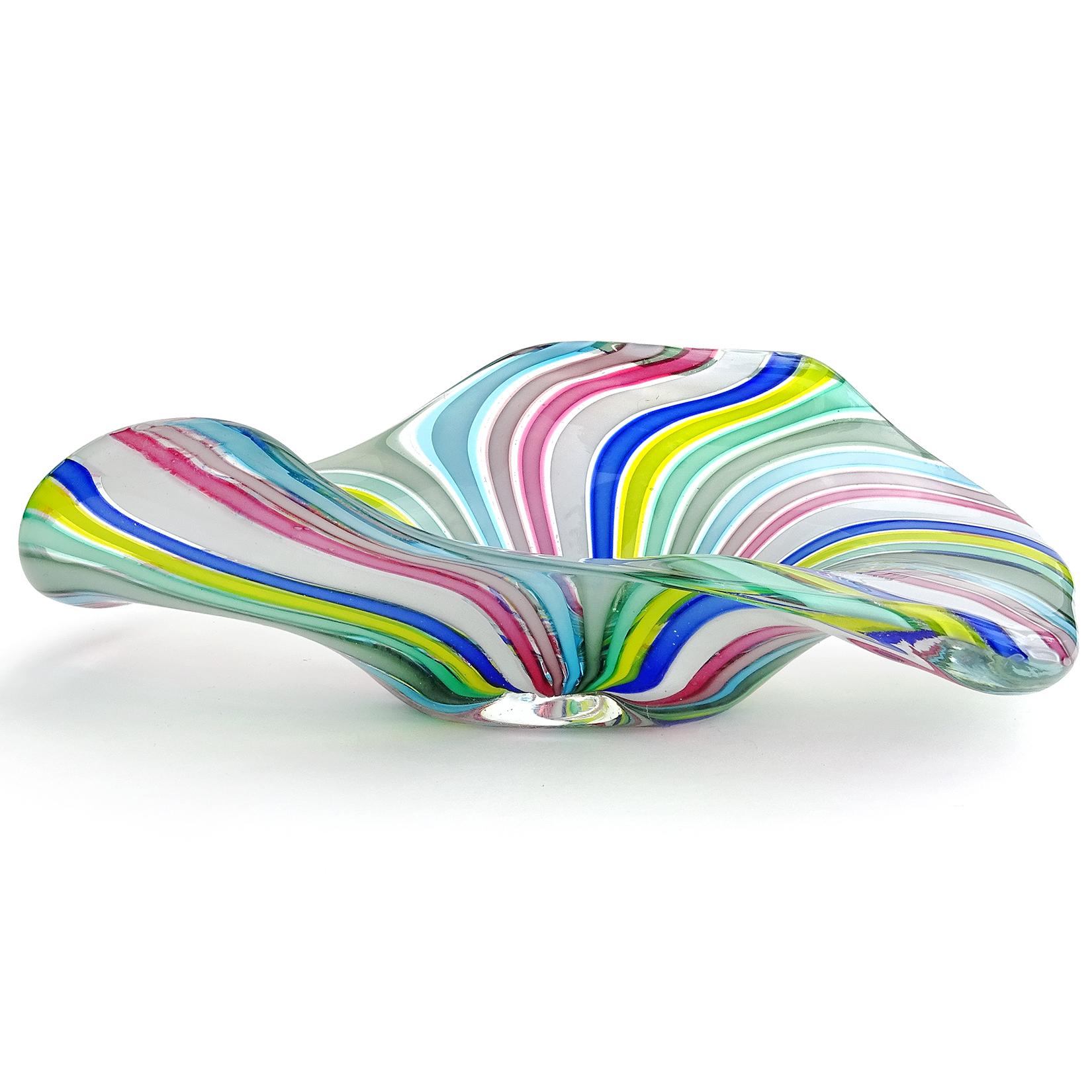 Beautiful and colorful vintage Murano hand blown rainbow Filigrana ribbons Italian art glass bowl. Documented to designer Fratelli Toso. It still retains its original 