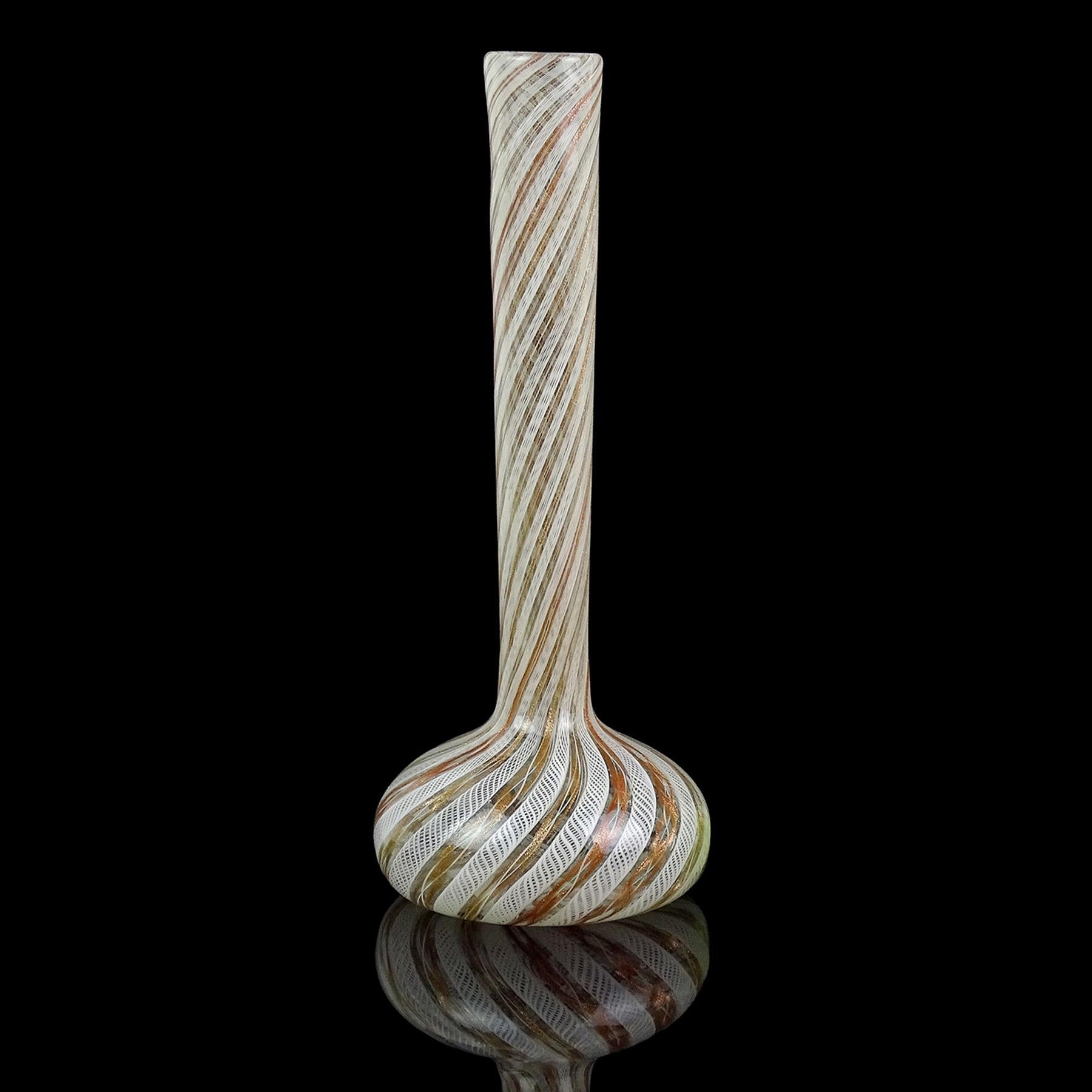 Beautiful vintage Murano hand blown green and white ribbons Italian art glass soliflore flower vase. The piece is documented to the Fratelli Toso company. The vase is made with intricate twisting copper and white 