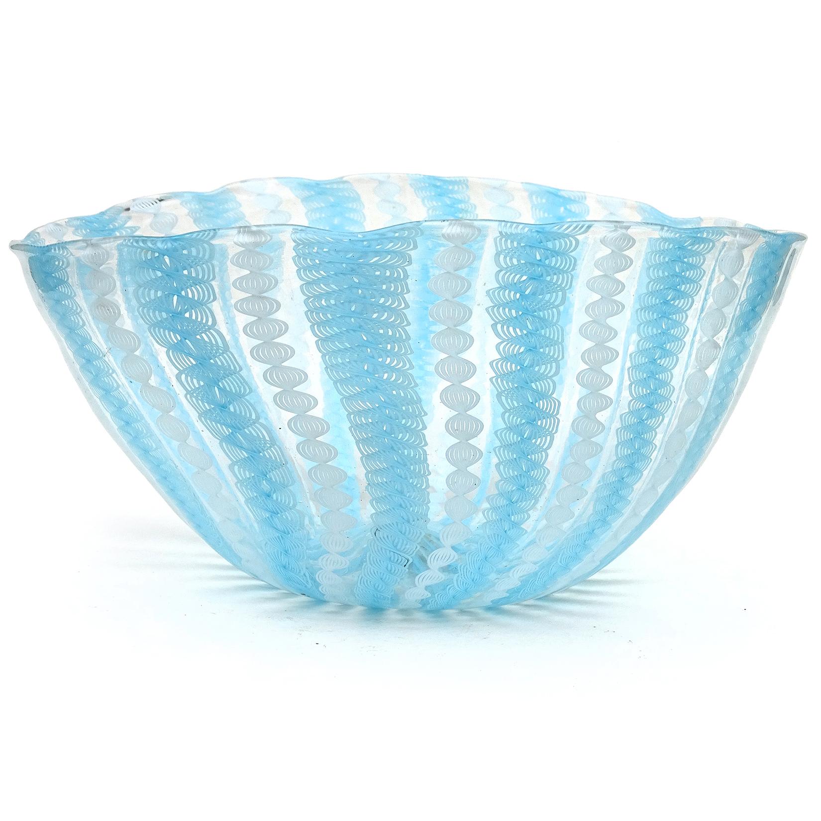 Beautiful large, vintage murano hand blown sky blue and white Zanfirico ribbons Italian art glass centerpiece bowl. Attributed to the Fratelli Toso company. The bowl still has a blue and silver 