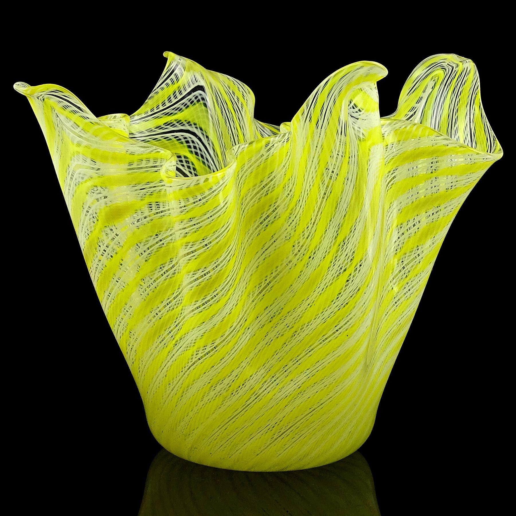 Beautiful vintage Murano hand blown bright yellow and white Zanfirico twisting ribbons Italian art glass sculptural handkerchief / fazzoletto flower vase. Documented to the Fratelli Toso company. The vase has an unusual color, and creates a unique