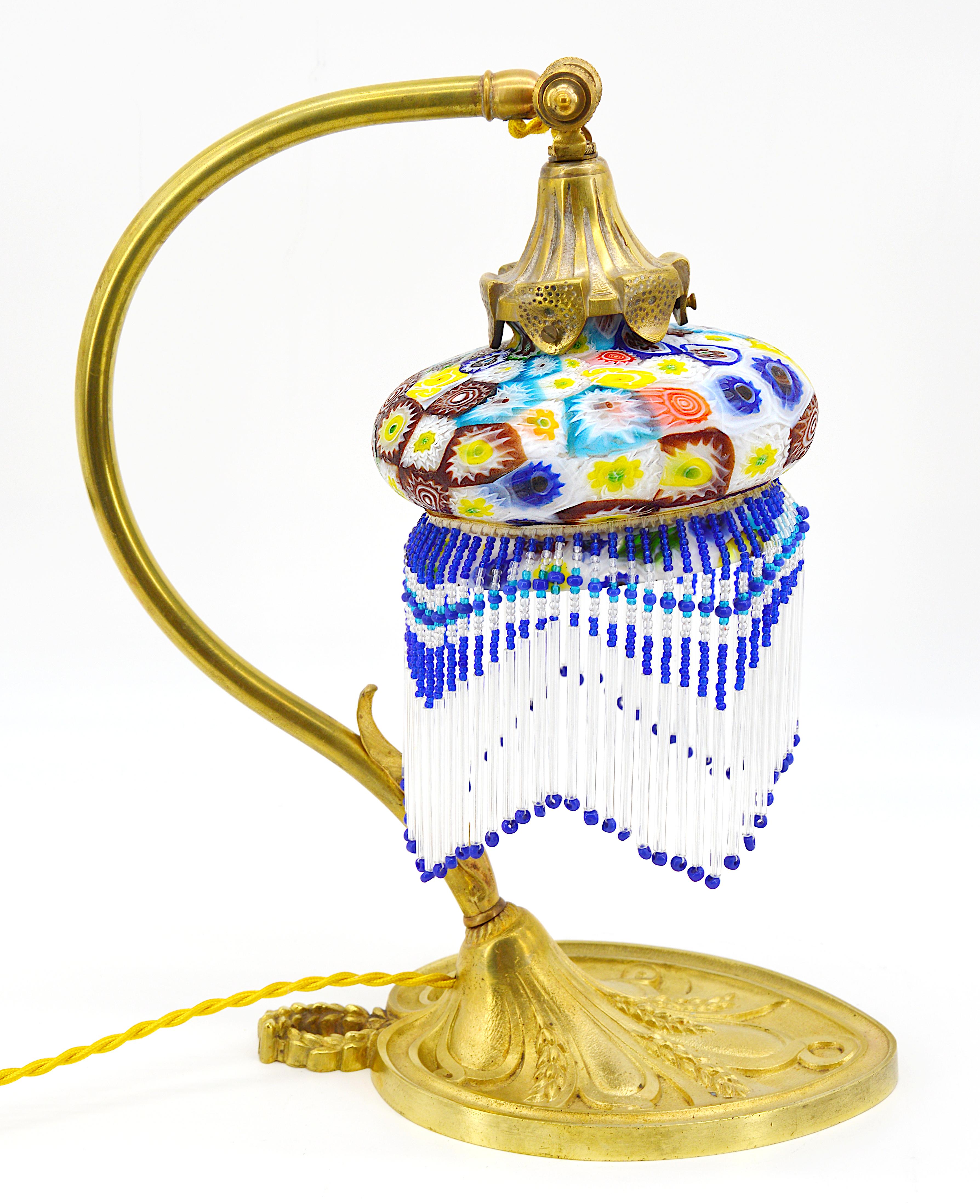 Glass murine and bronze table lamp by Fratelli Toso, Murano, Venice, Italy, 1900s. Glass drops. Measures: Height 13.4
