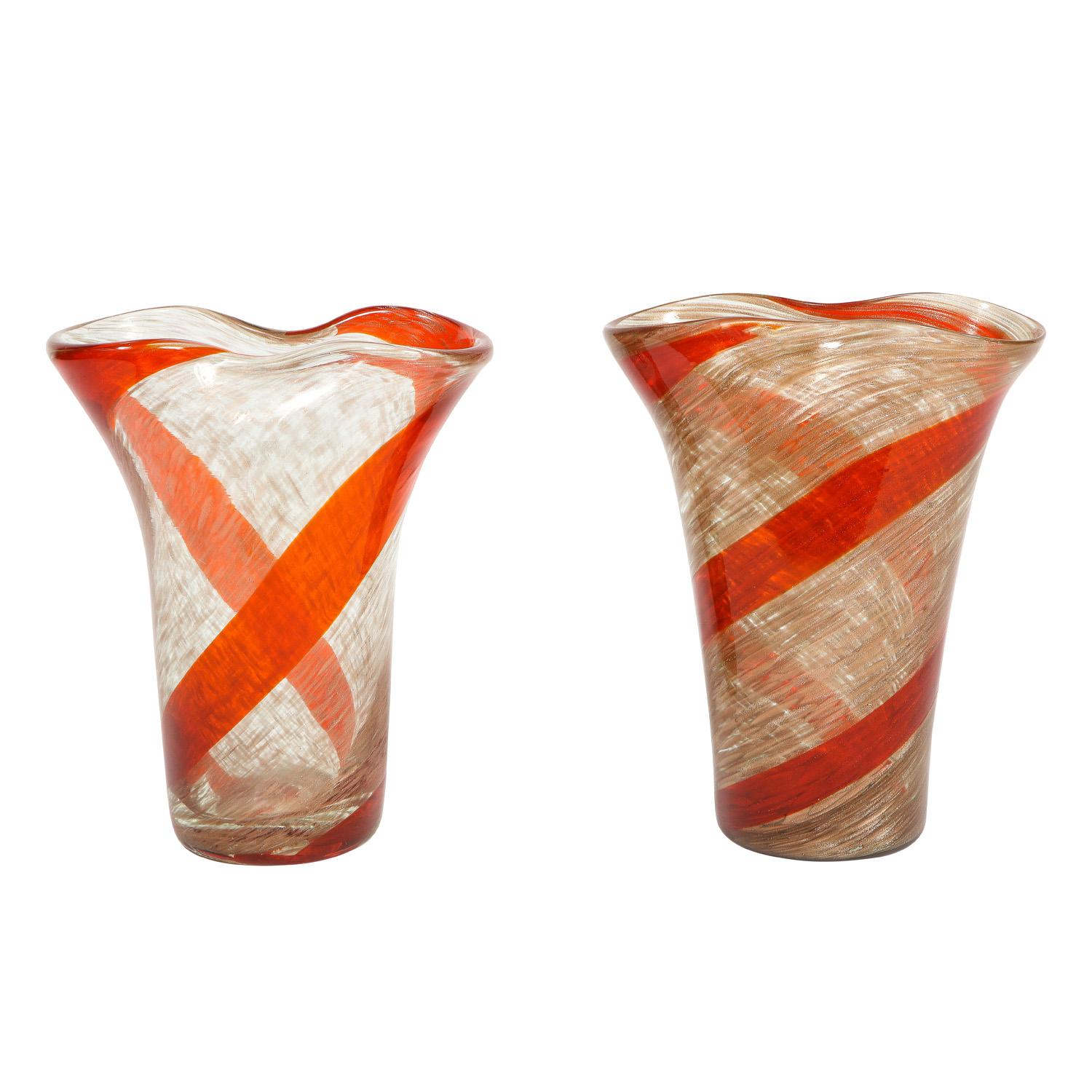 2 Stunning hand-blown glass vases with red spiral design by Fratelli Toso, Murano, Italy, 1950’s. They are pinched at the top with aventurine (gold) throughout the glass. These both shimmer like jewels.