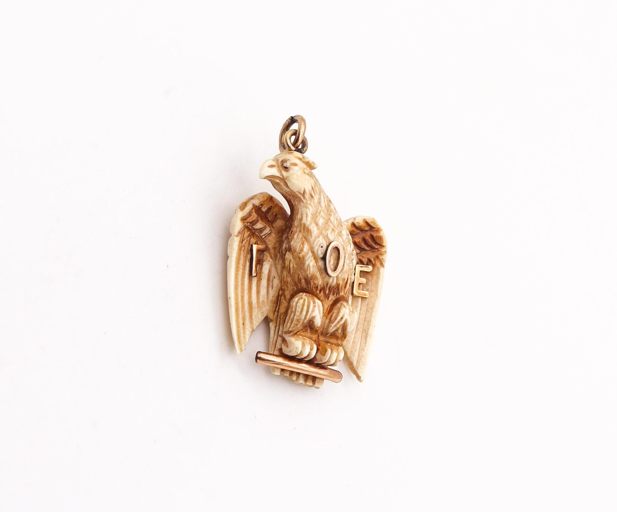 A pendant from the Fraternal Order of Eagles.

Beautiful piece of historical America, from the Fraternal Order of Eagles, made around the 1900. It was carved in the shape of the American eagle and accented with parts made up in yellow gold of 10