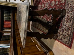 A small chest made of walnut in the Baroque style, dating from the 18th century.