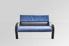 Canapé deux places Frau en cuir polychrome et métal