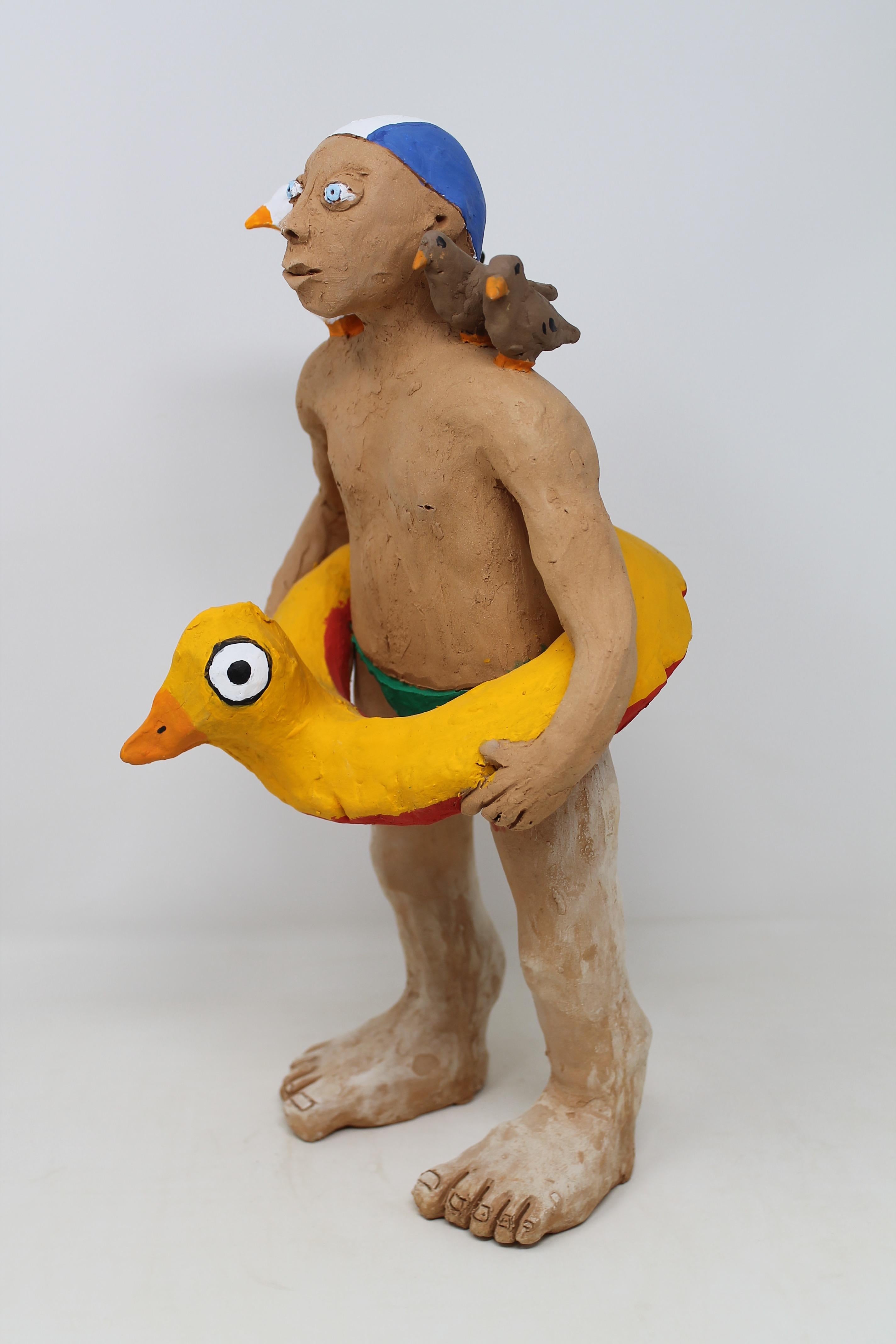 Small sculptures in terracotta. 
Starting from the clay, the piece is dried and baked in the oven at 900 degrees. Covered with acrylic colors or in majolica, 30 cm, 40 cm and 50 cm high in three sizes Human figures nicely hybridized with zoomorphic
