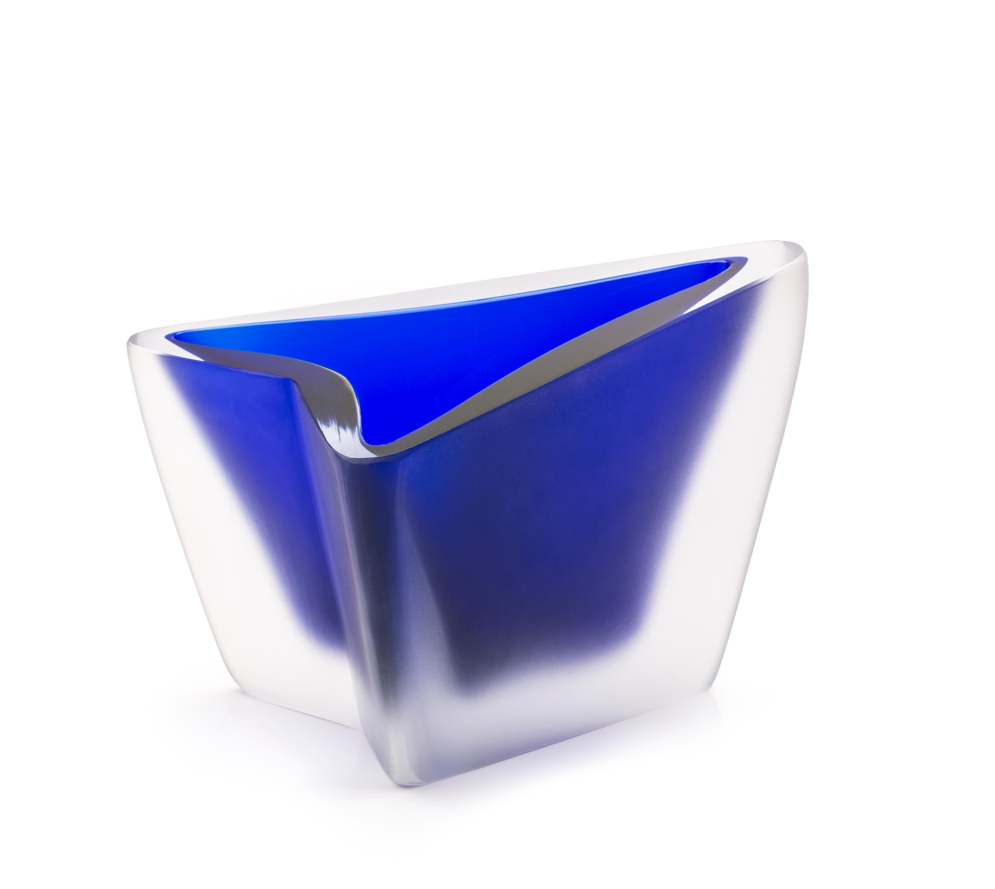 Freccia small blue vase by Purho
Dimensions: D25 x W21 x H16 cm
Materials: Glass
other colours and dimensions are available.
Purho is a new protagonist of made in Italy design , a work of synthesis, a research that has lasted for years, an