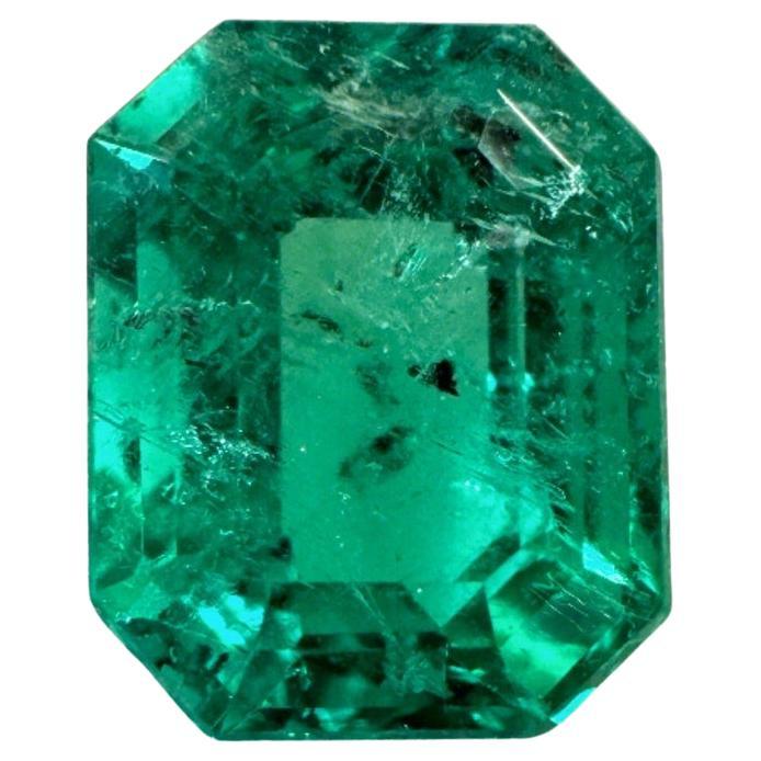 Freckled Bluish Green 2.12 Carat Emerald Cut Colombian Emerald Gem - May